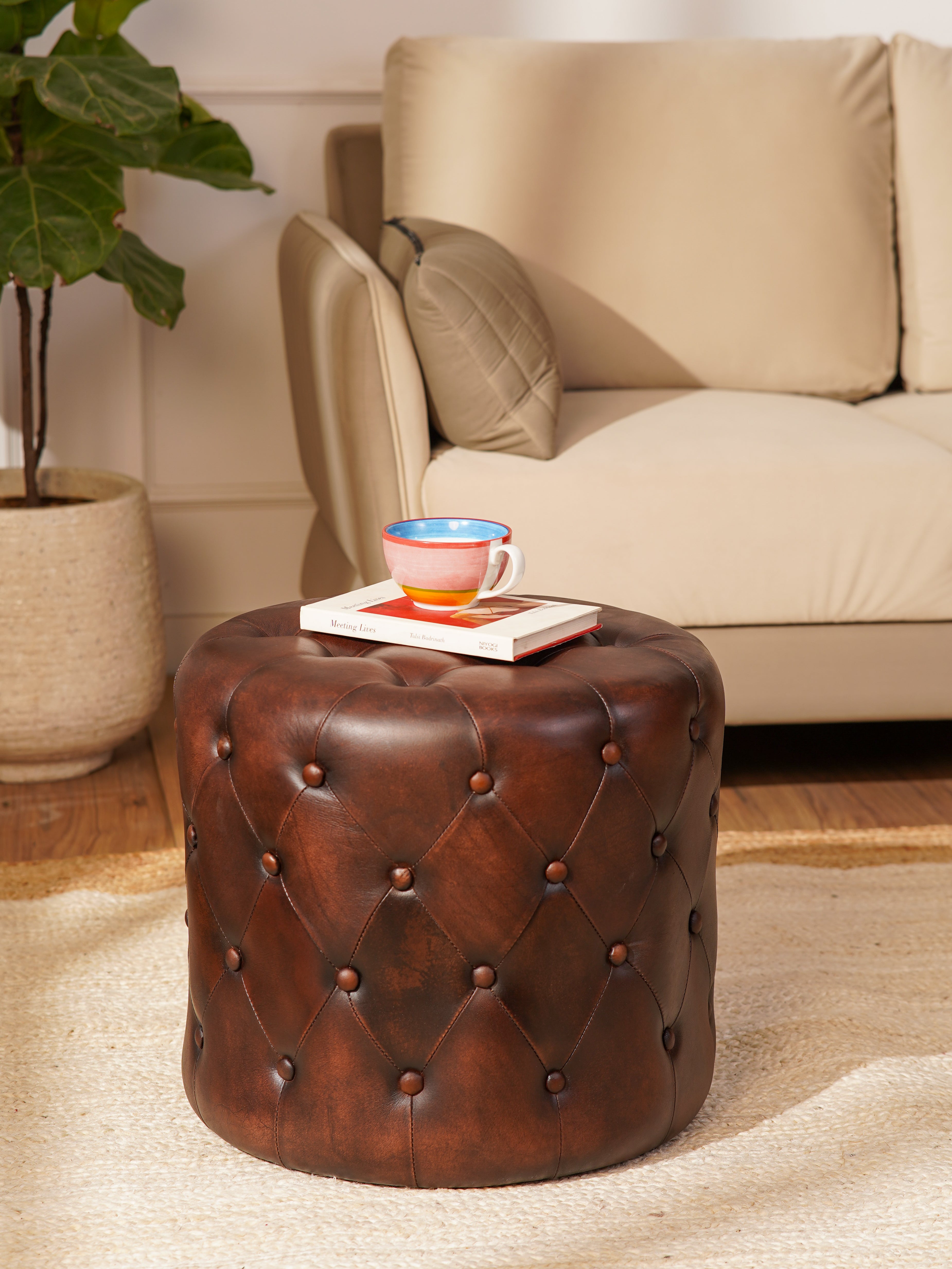 The Regal Repose – Round Tufted Leather Ottoman with Solid Wood Frame