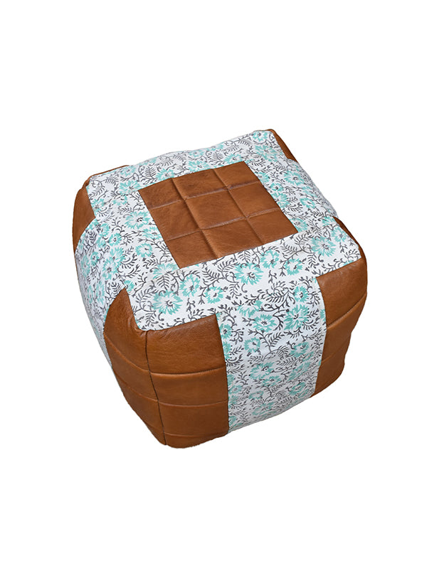 Top-down view of handmade pouf showing canvas patchwork design