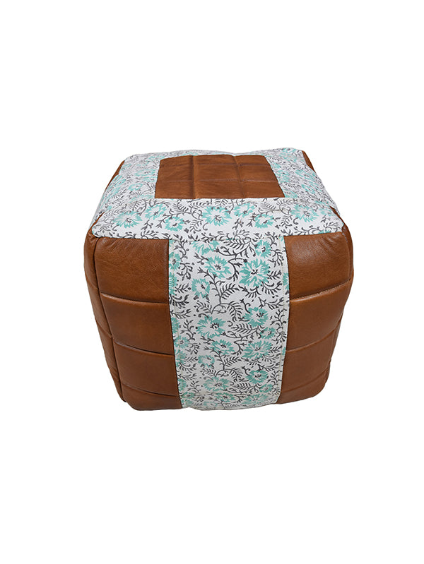 Top-down view of handmade pouf showing canvas patchwork design