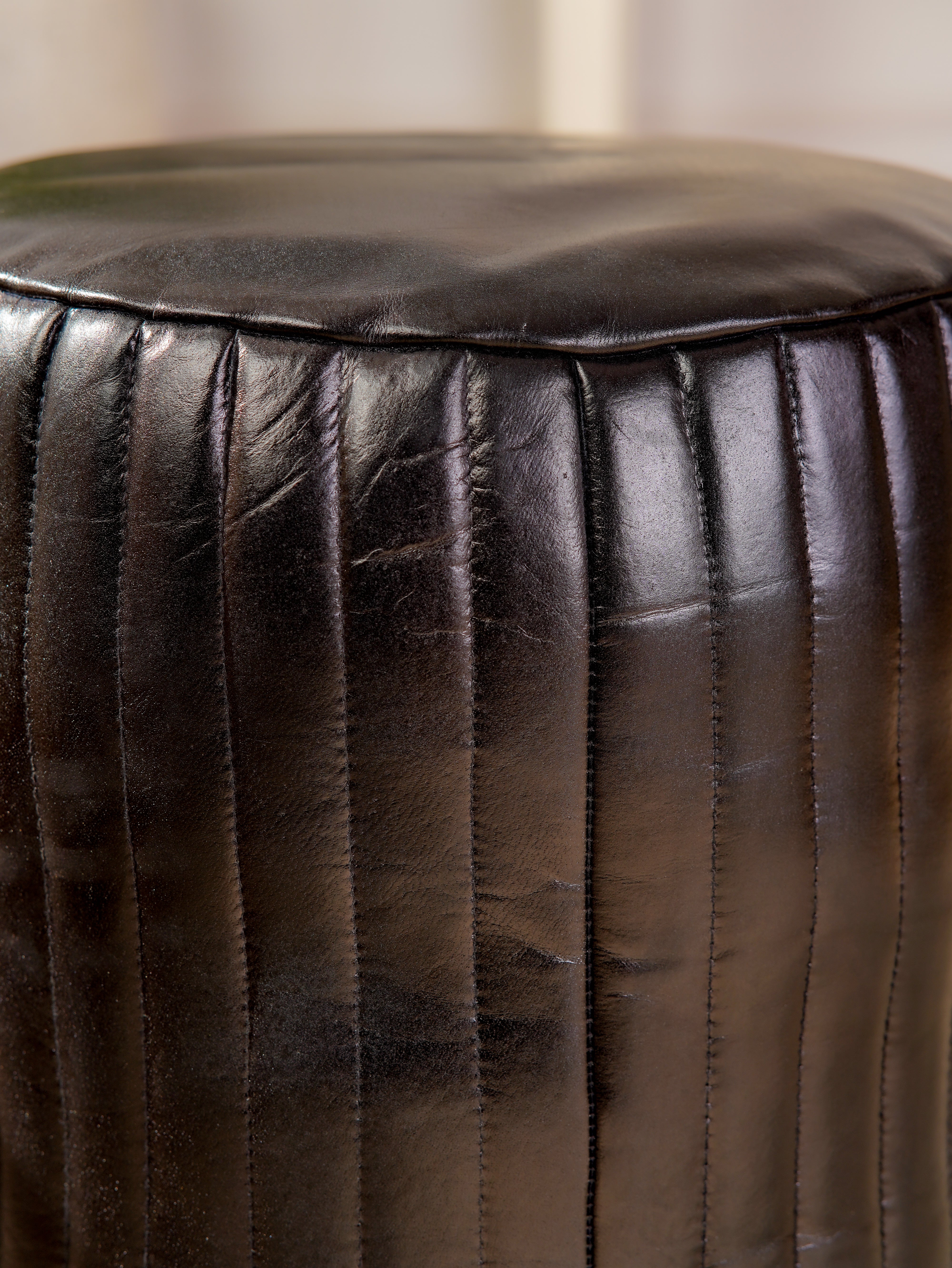 Round Buffalo Leather Pouf โ Eclipse Ottoman | Handmade | Black | Filled