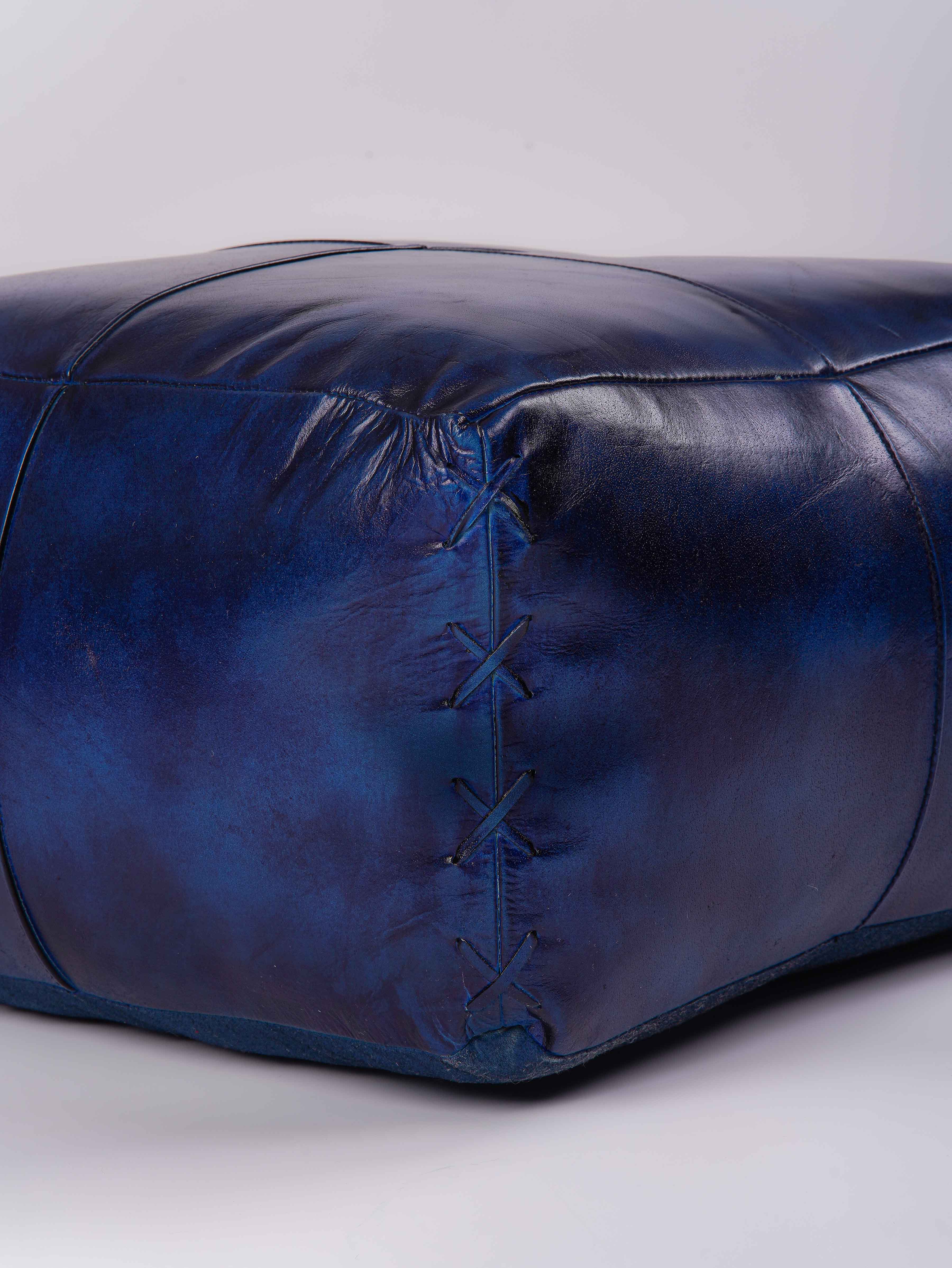 Detail of milled full grain buffalo leather and hand-stitched seams