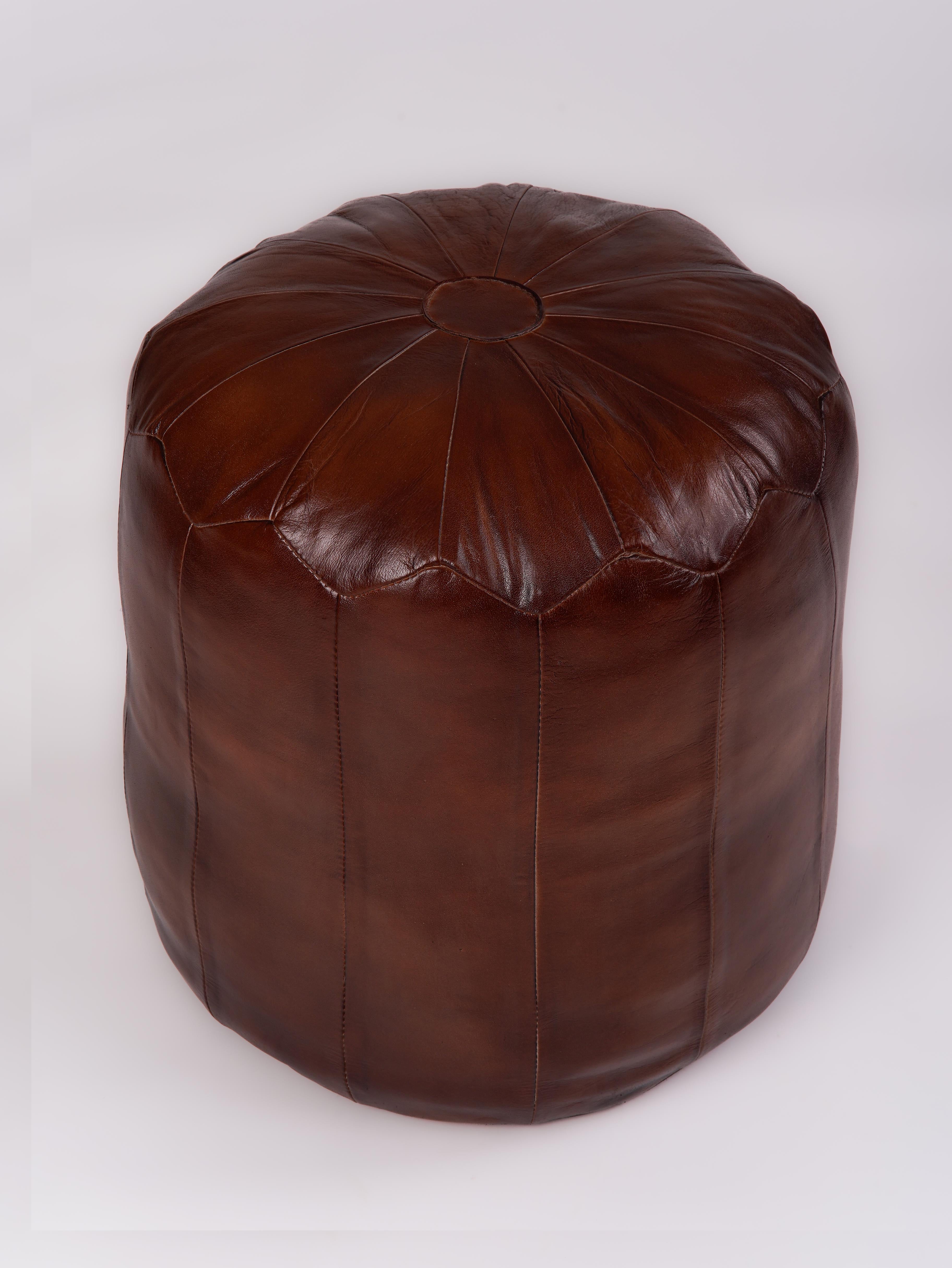 Artisan-made brown leather pouf ottoman shown in various positions