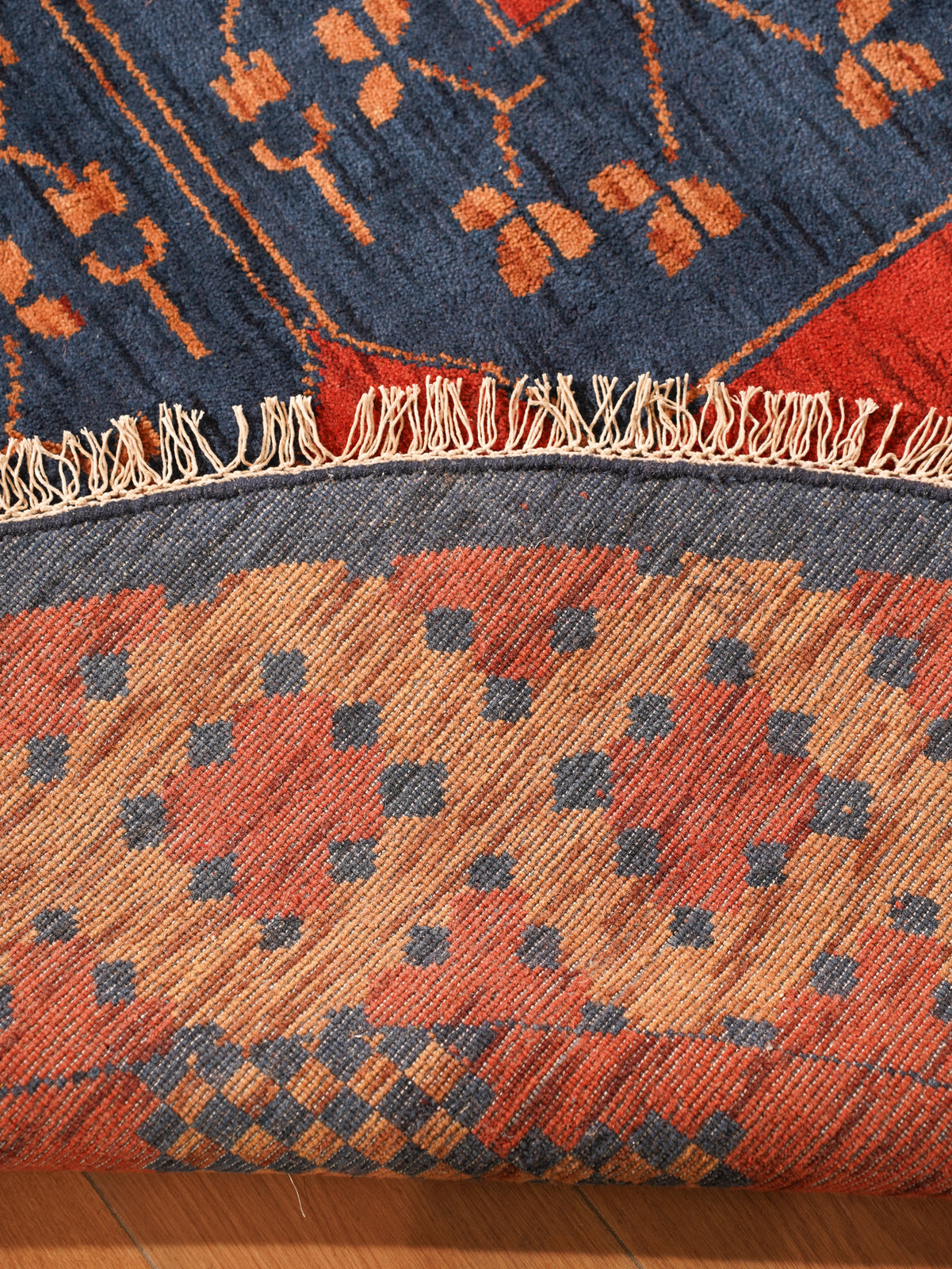 Rust Ember Tribal Hand-Knotted Wool Rug with Indigo Geometric Panel Design
