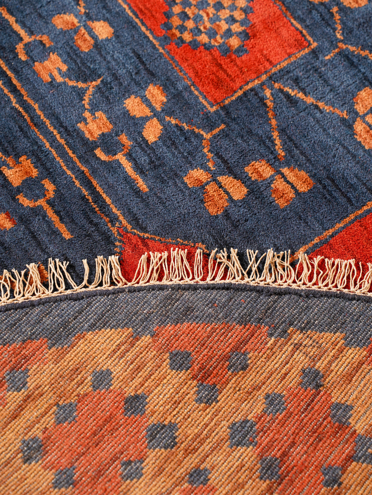 Rust Ember Tribal Hand-Knotted Wool Rug with Indigo Geometric Panel Design