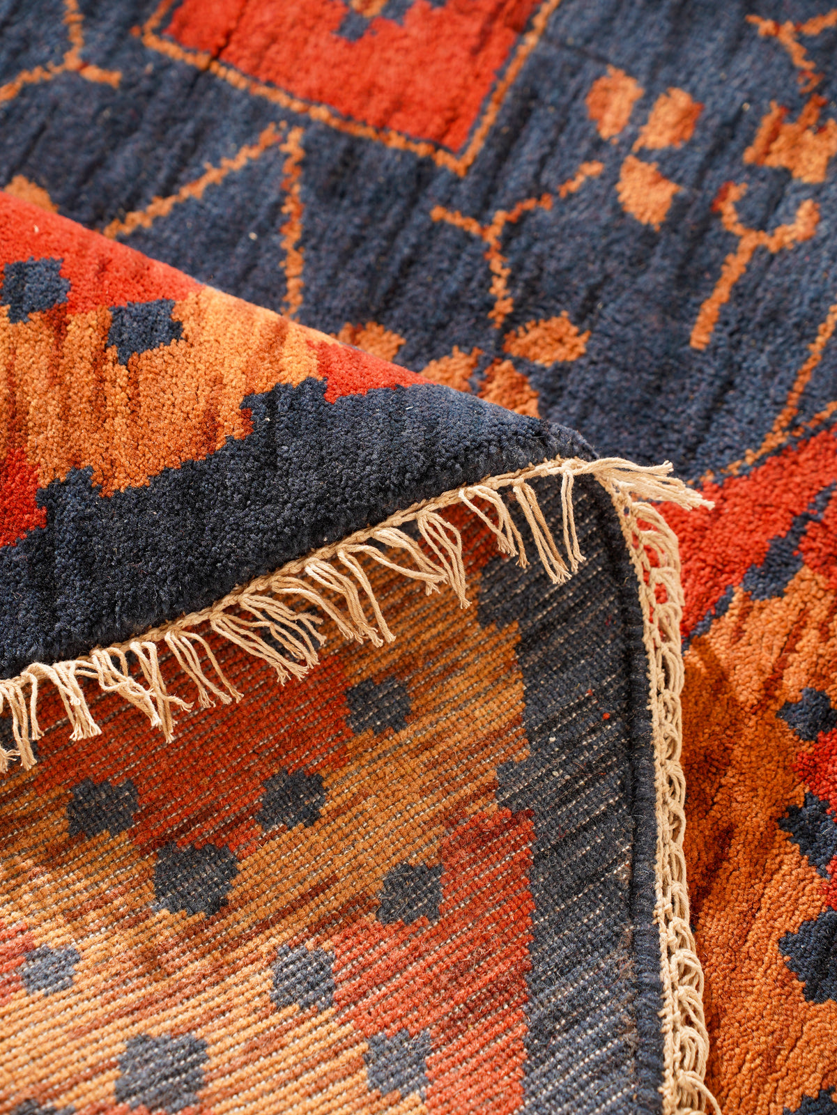 Rust Ember Tribal Hand-Knotted Wool Rug with Indigo Geometric Panel Design