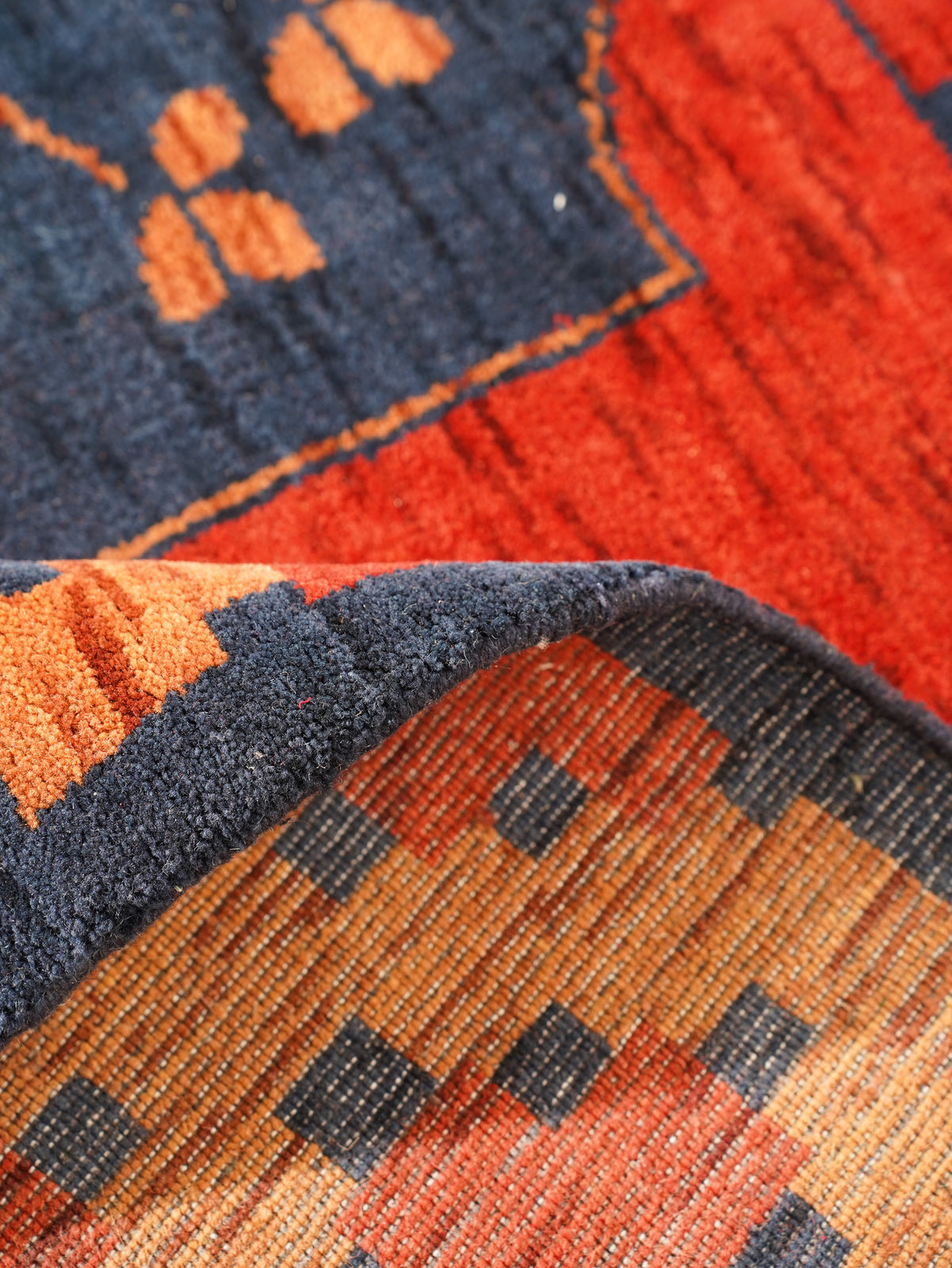 Rust Ember Tribal Hand-Knotted Wool Rug with Indigo Geometric Panel Design