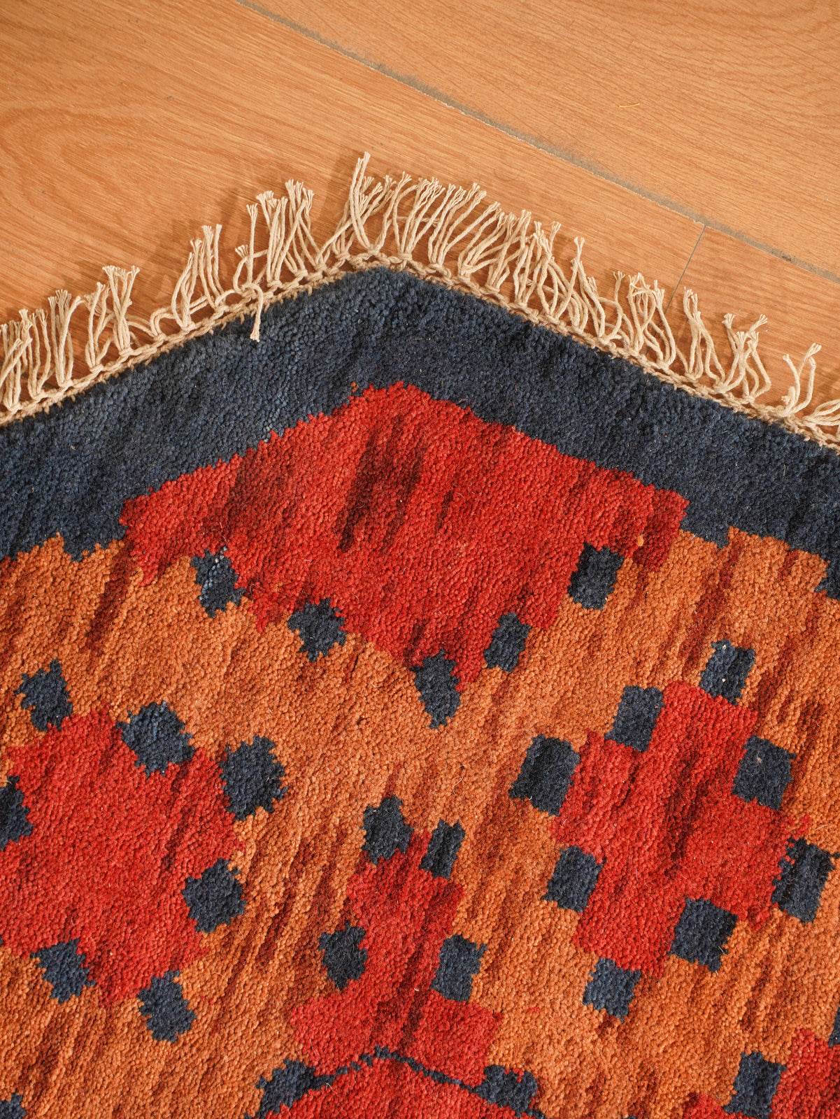 Rust Ember Tribal Hand-Knotted Wool Rug with Indigo Geometric Panel Design
