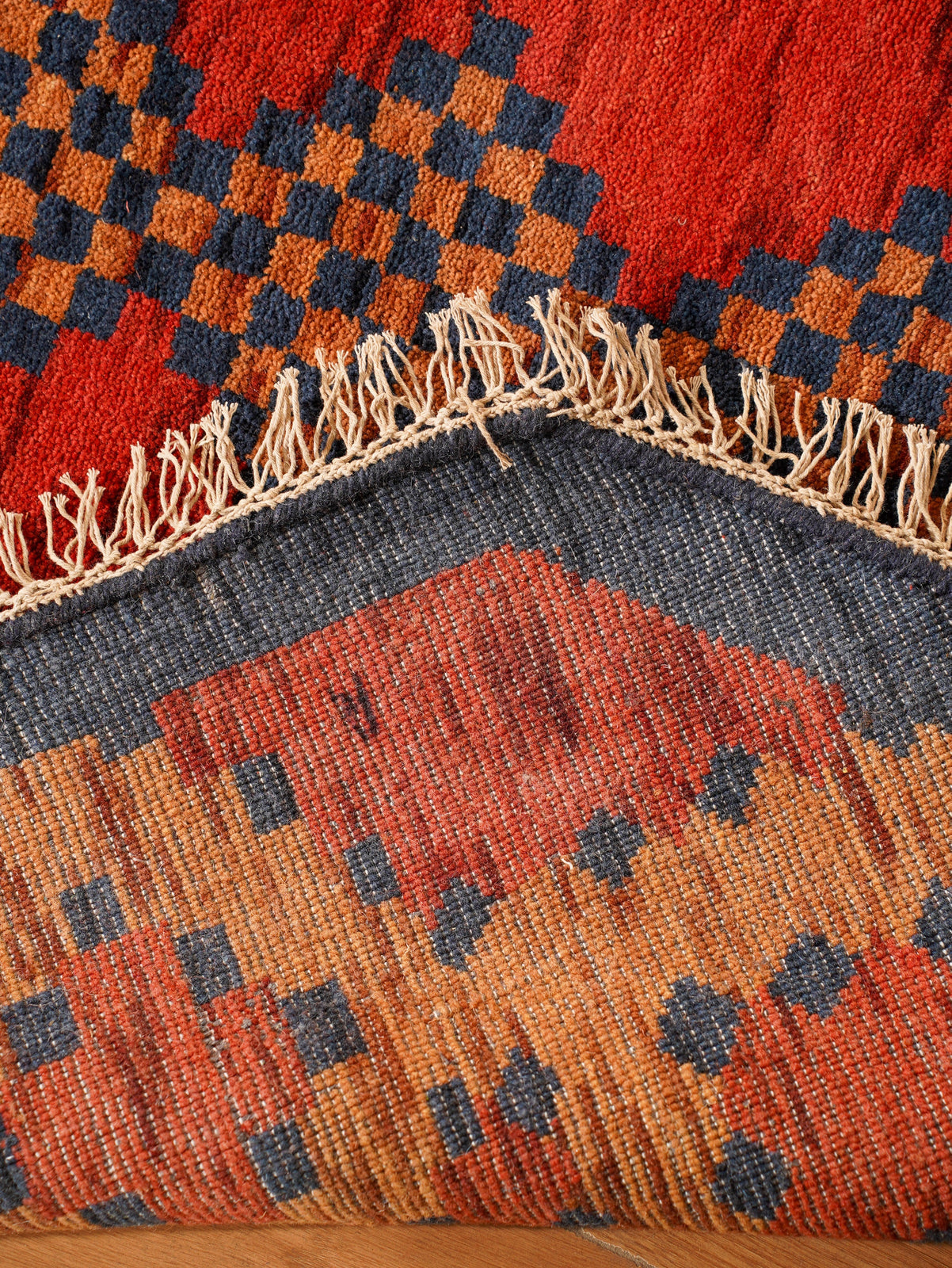 Rust Ember Tribal Hand-Knotted Wool Rug with Indigo Geometric Panel Design