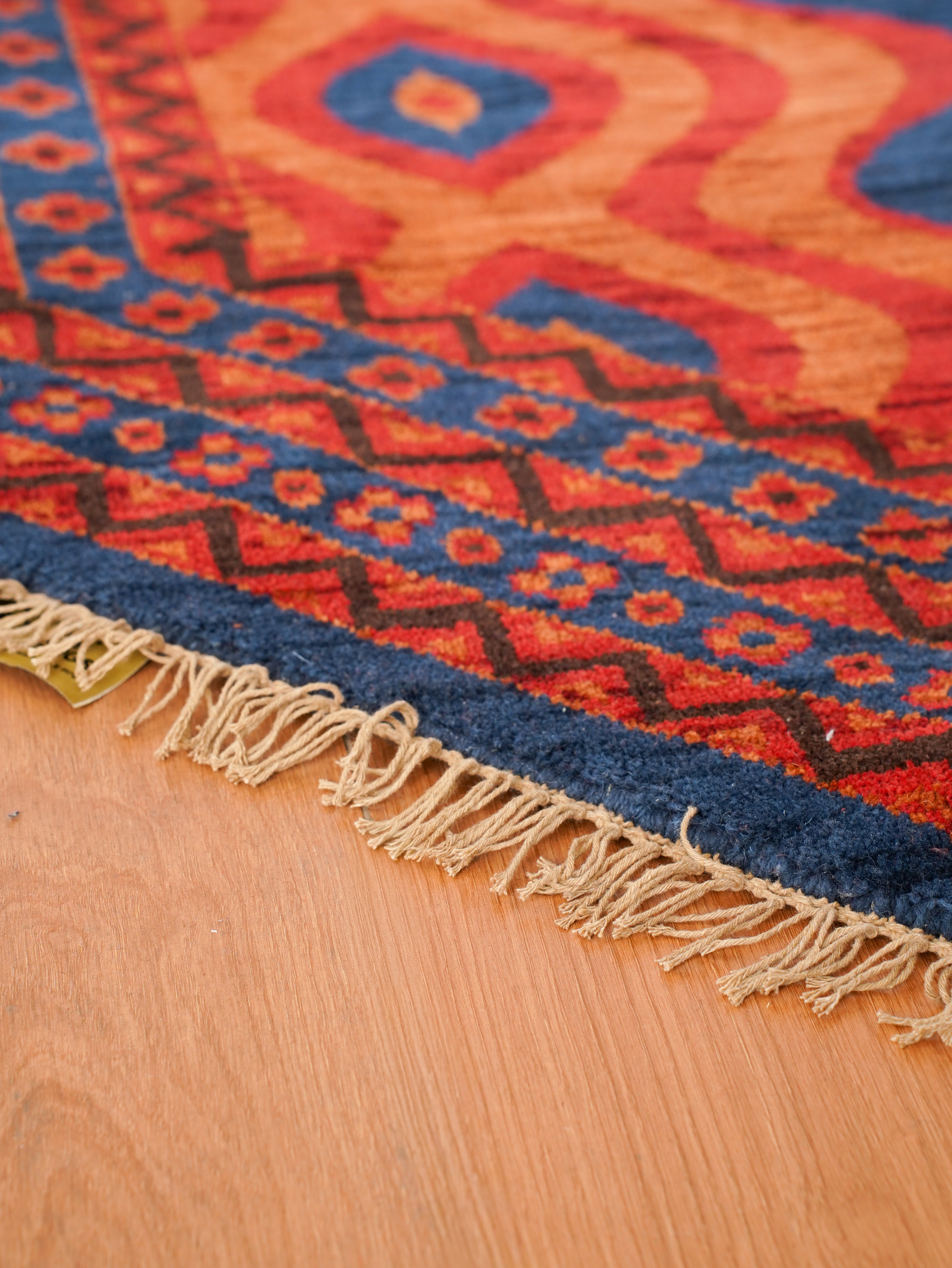 Hand-Knotted Multicolor Wool Oriental Area Rug with Tribal Geometric Design