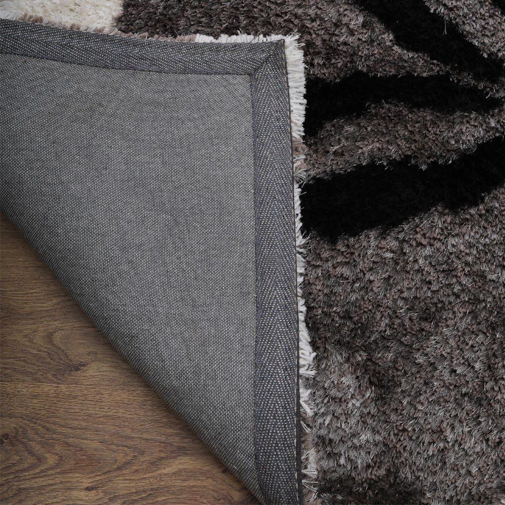 Nitya Hand Tufted Shag Polyester Area Rug