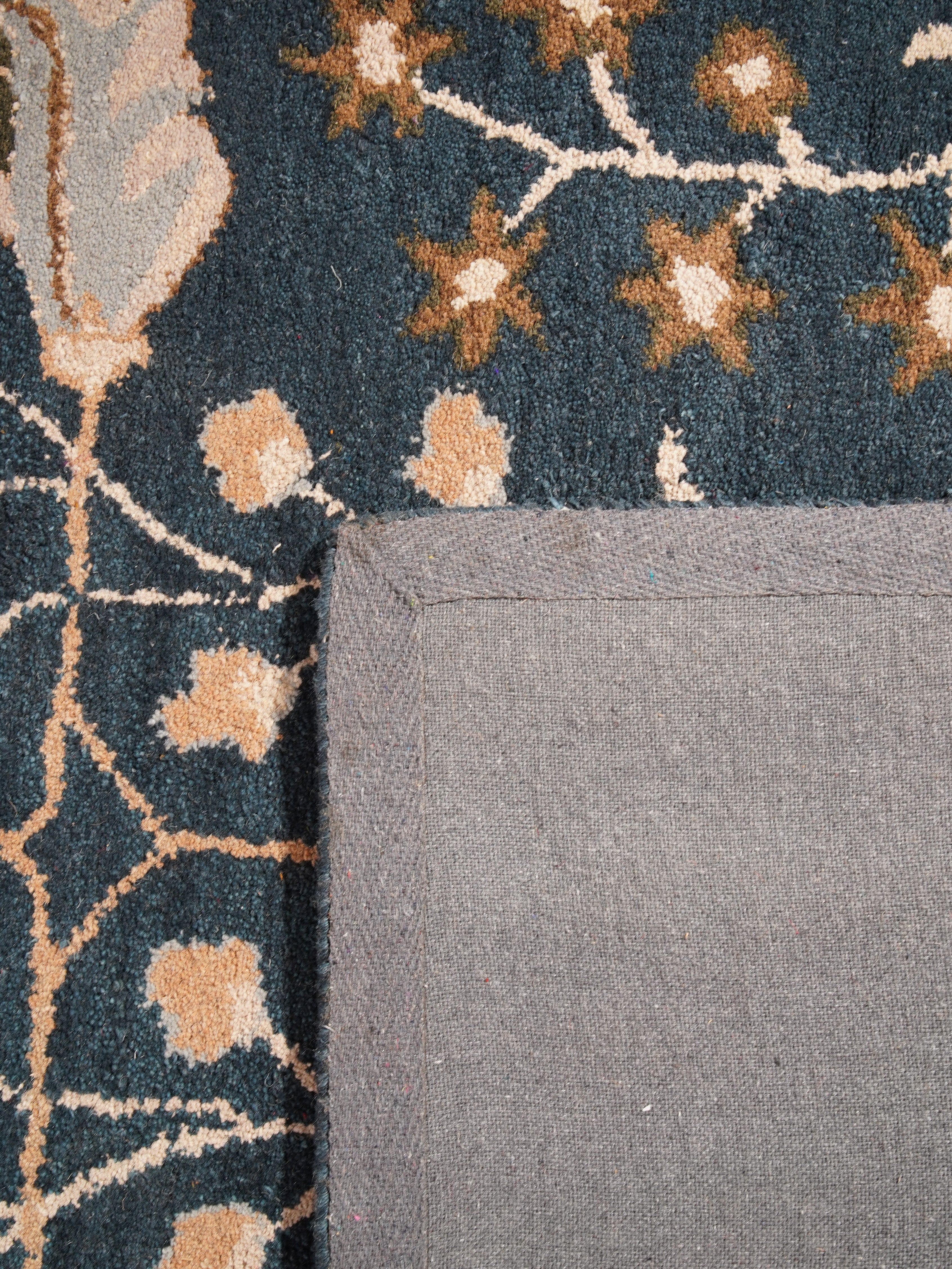 Jivin Hand Tufted Floral Wool Rug