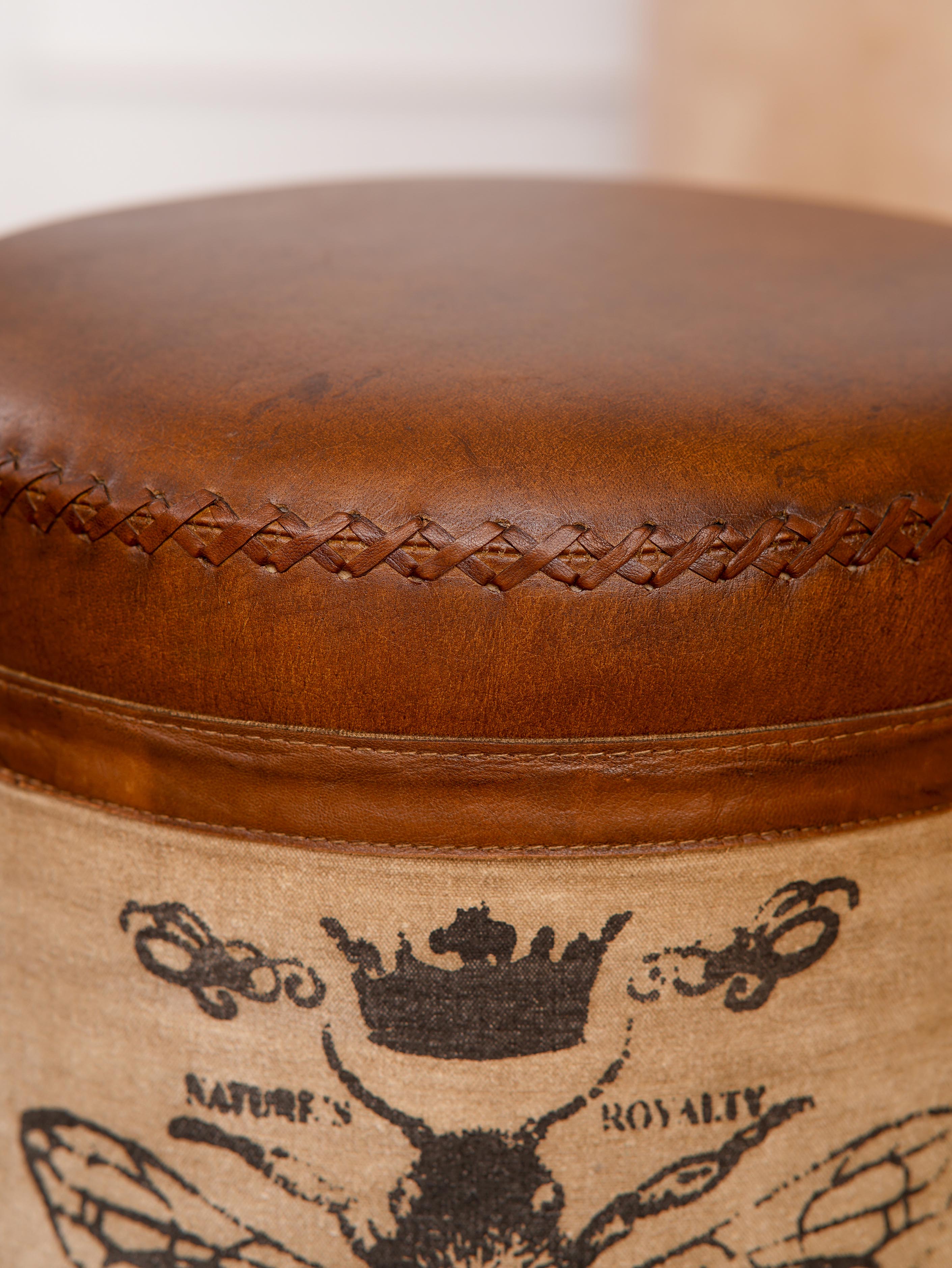 The Pollinator Ottoman – Round Upcycled Tin Base | Canvas & Leather Upholstery | Artisan Accent Seat