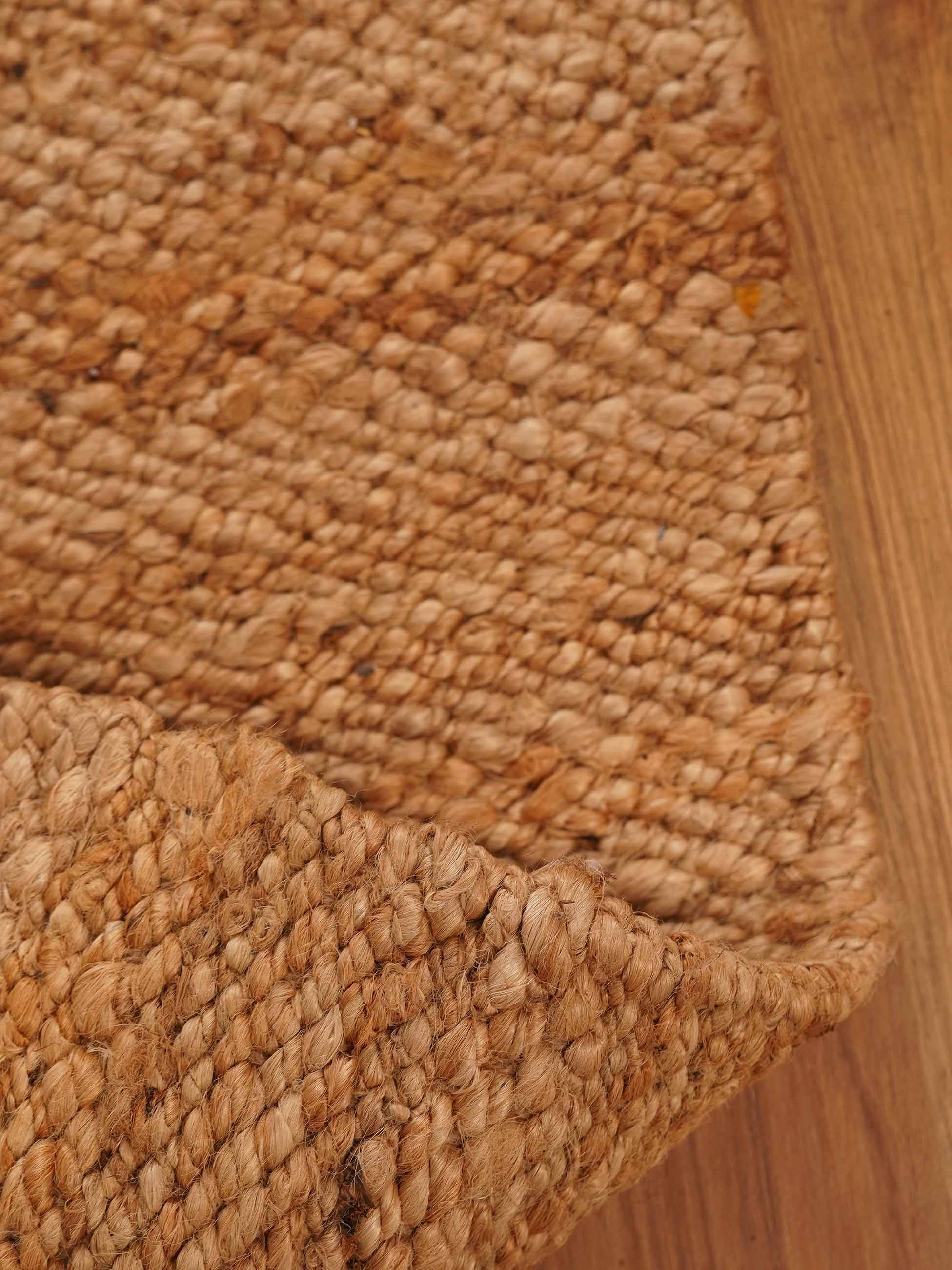 Detail of braided weave pattern on natural jute rug