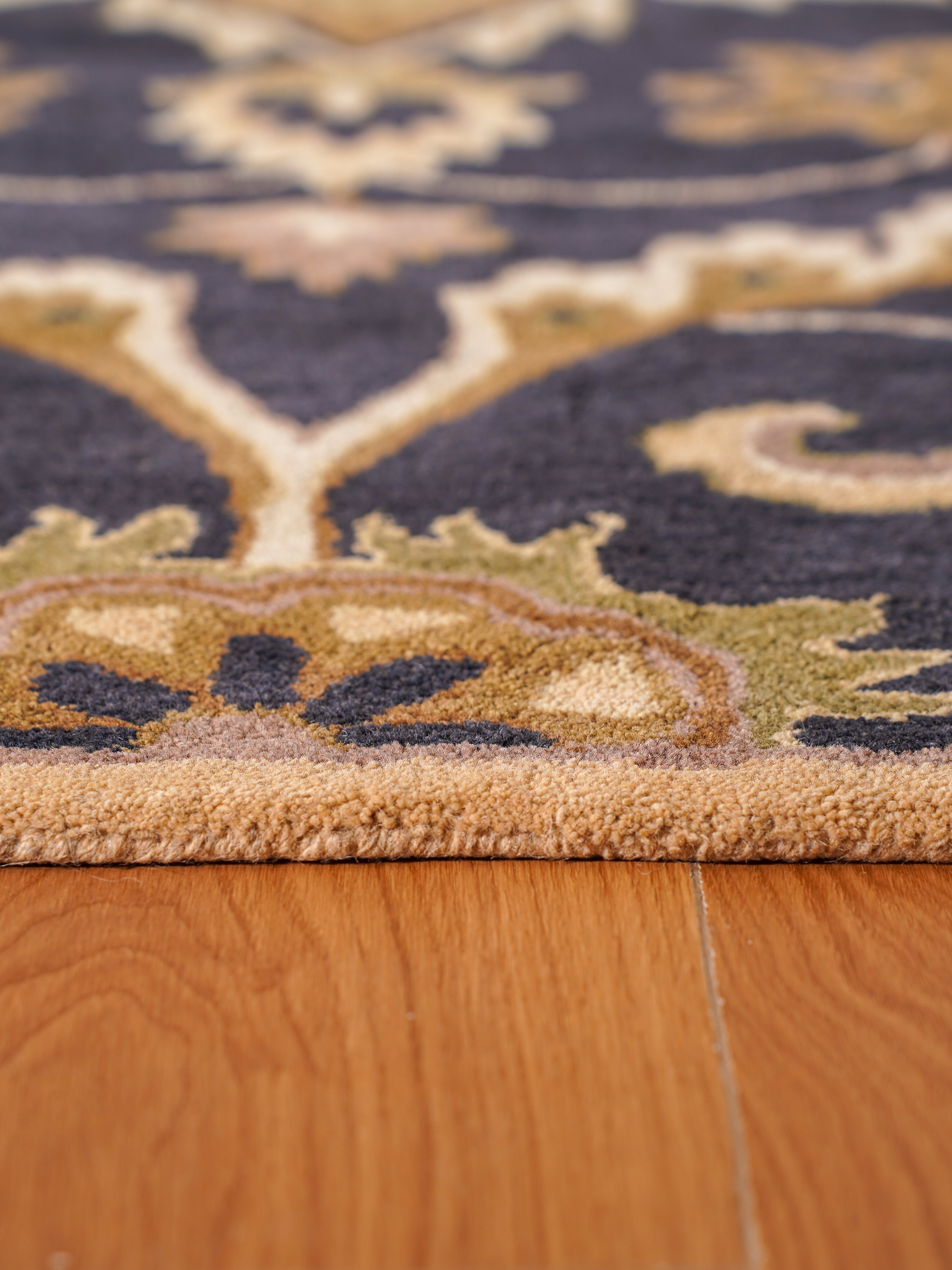 Aavira Hand Tufted Oriental Area Rug