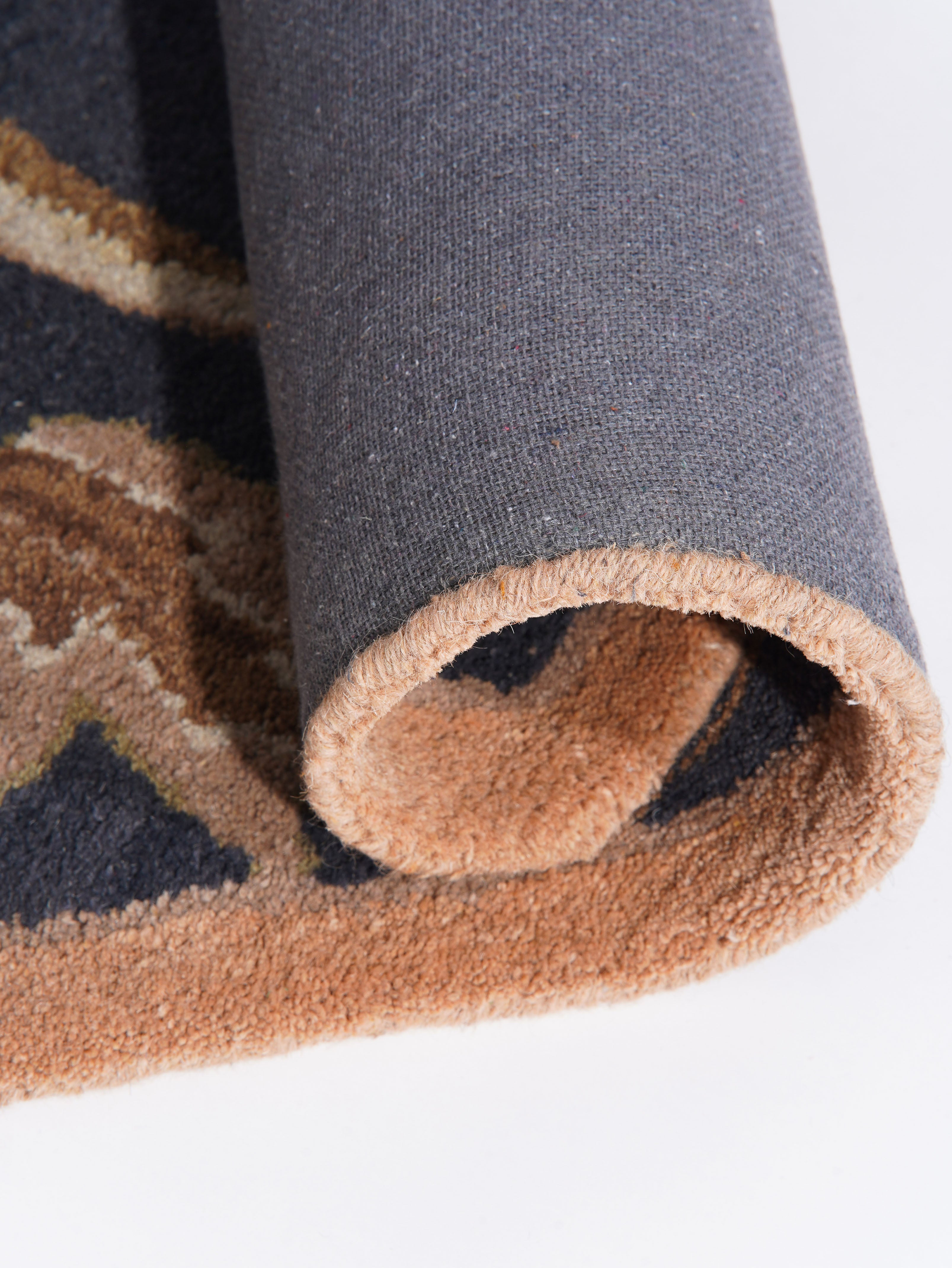 Aavira Hand Tufted Oriental Area Rug