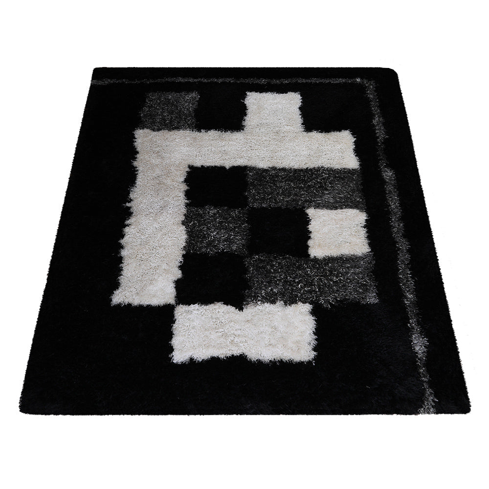 Yaksha Hand Tufted Shag Polyester Area Rug