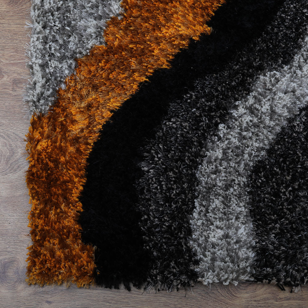 Flint Hand Tufted Shag Polyester Area Rug