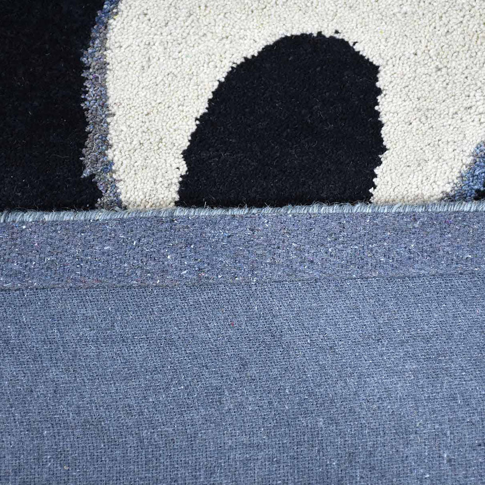 Rivan Hand Tufted Wool Area Rug