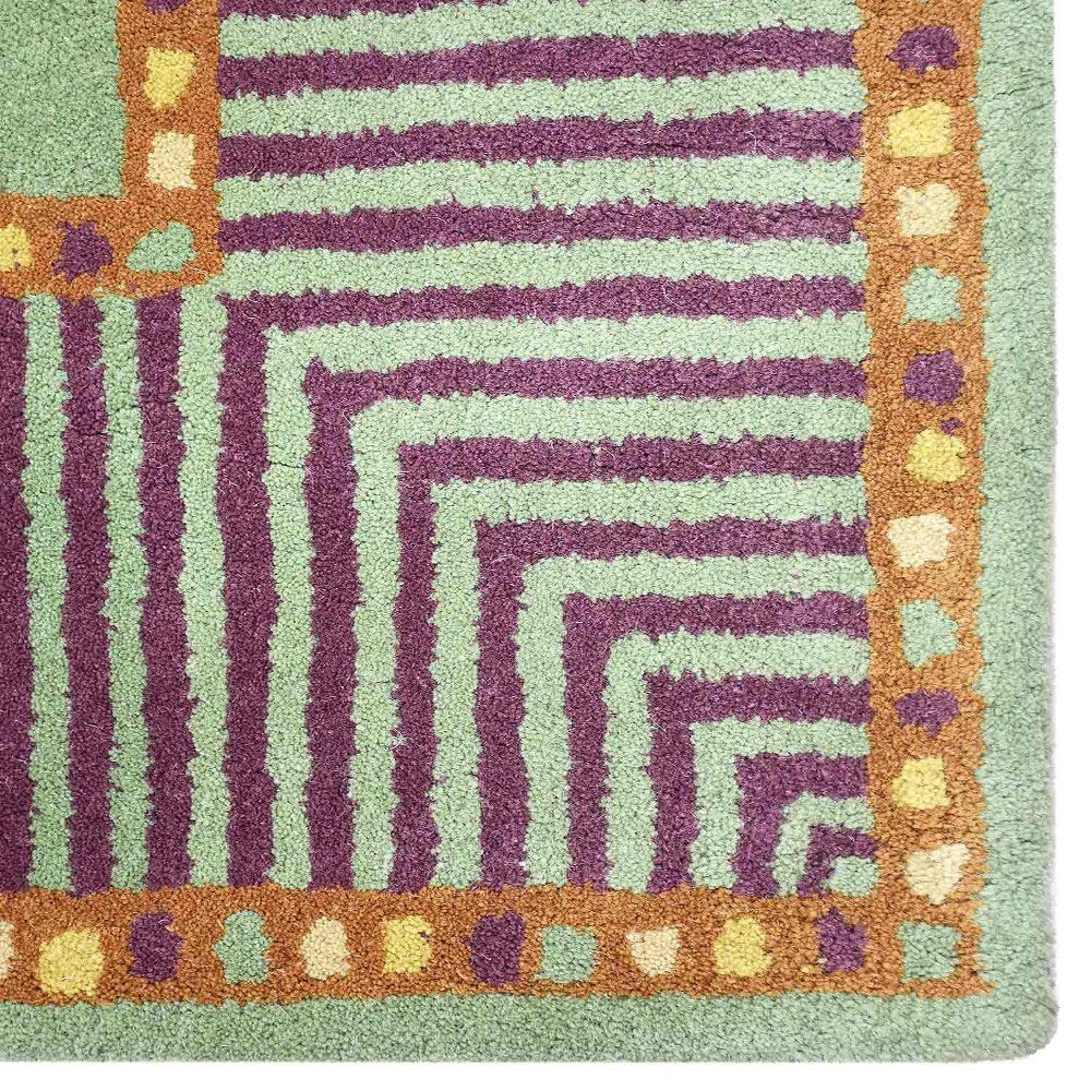 Nandini Hand Tufted Wool Area Rug