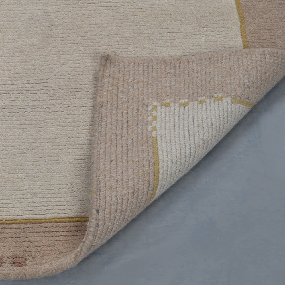 Leon Hand Knotted Tibbati Wool Area Rug