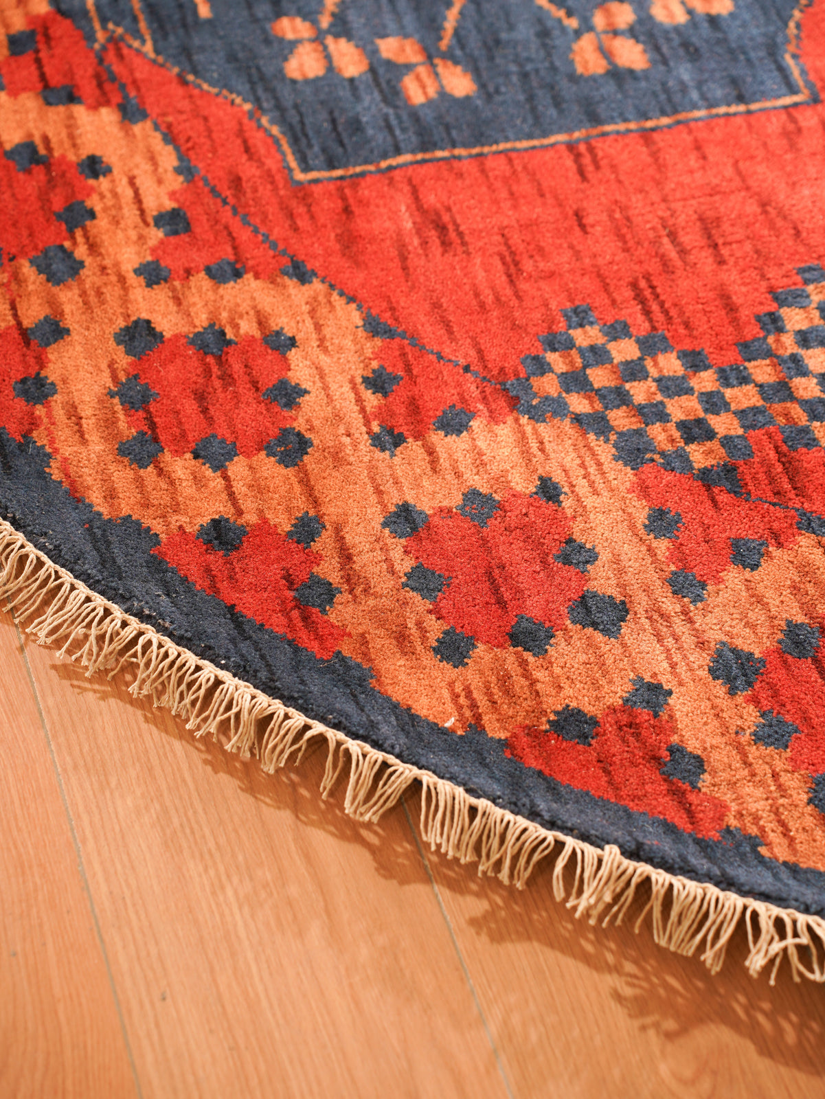 Rust Ember Tribal Hand-Knotted Wool Rug with Indigo Geometric Panel Design