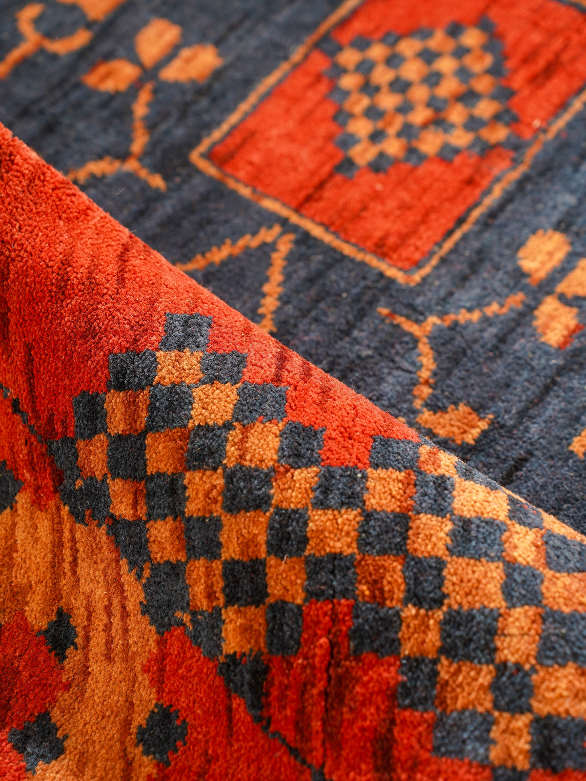 Rust Ember Tribal Hand-Knotted Wool Rug with Indigo Geometric Panel Design