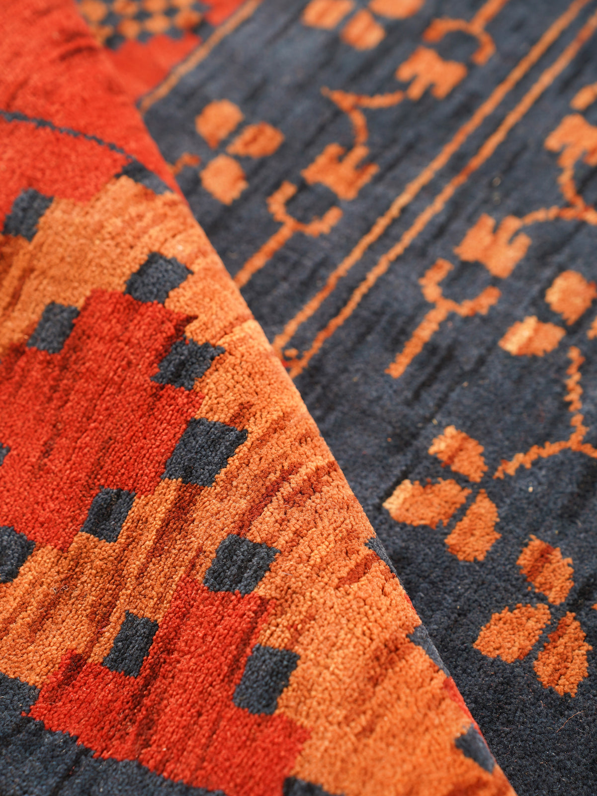 Rust Ember Tribal Hand-Knotted Wool Rug with Indigo Geometric Panel Design