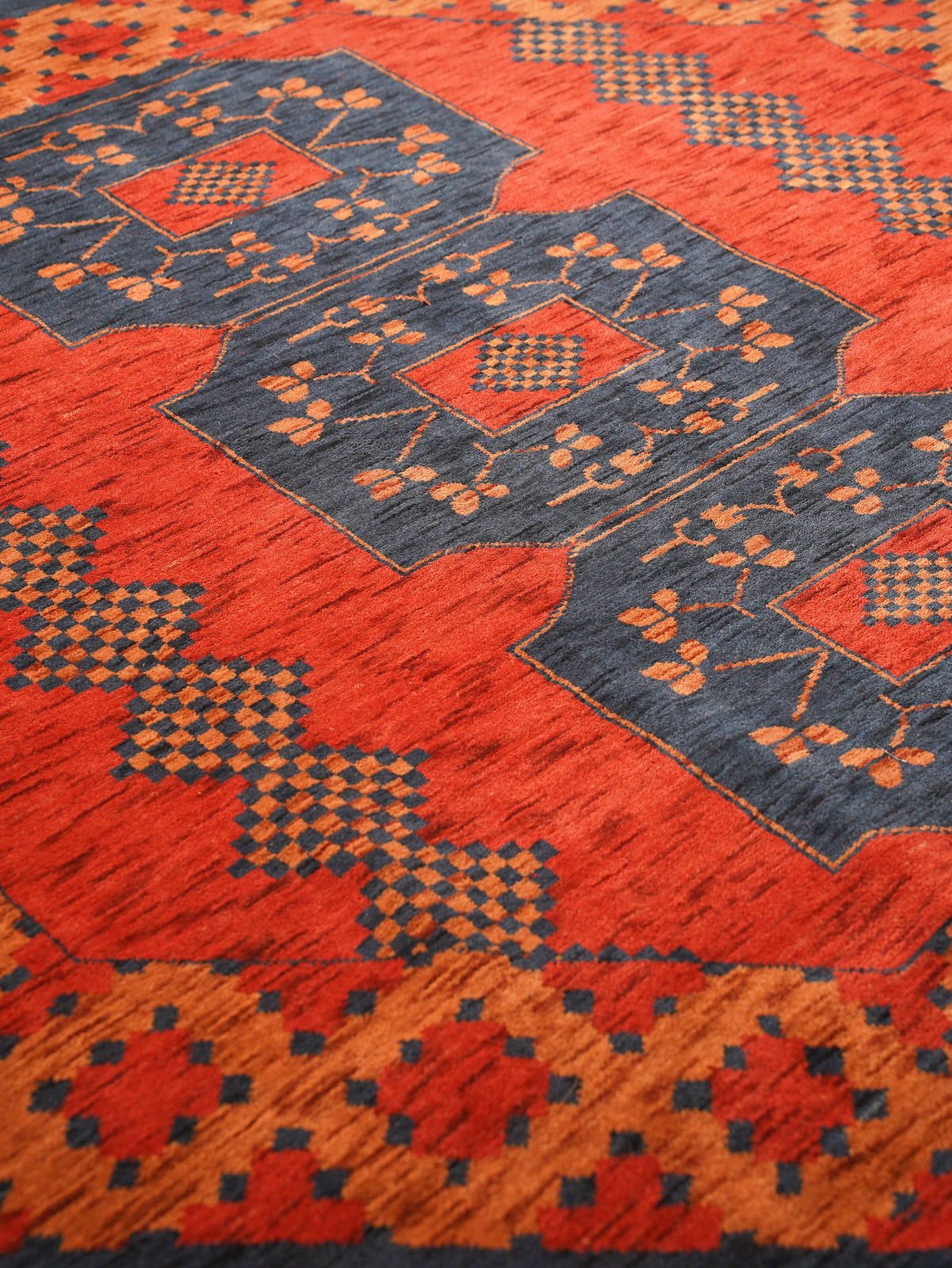 Rust Ember Tribal Hand-Knotted Wool Rug with Indigo Geometric Panel Design