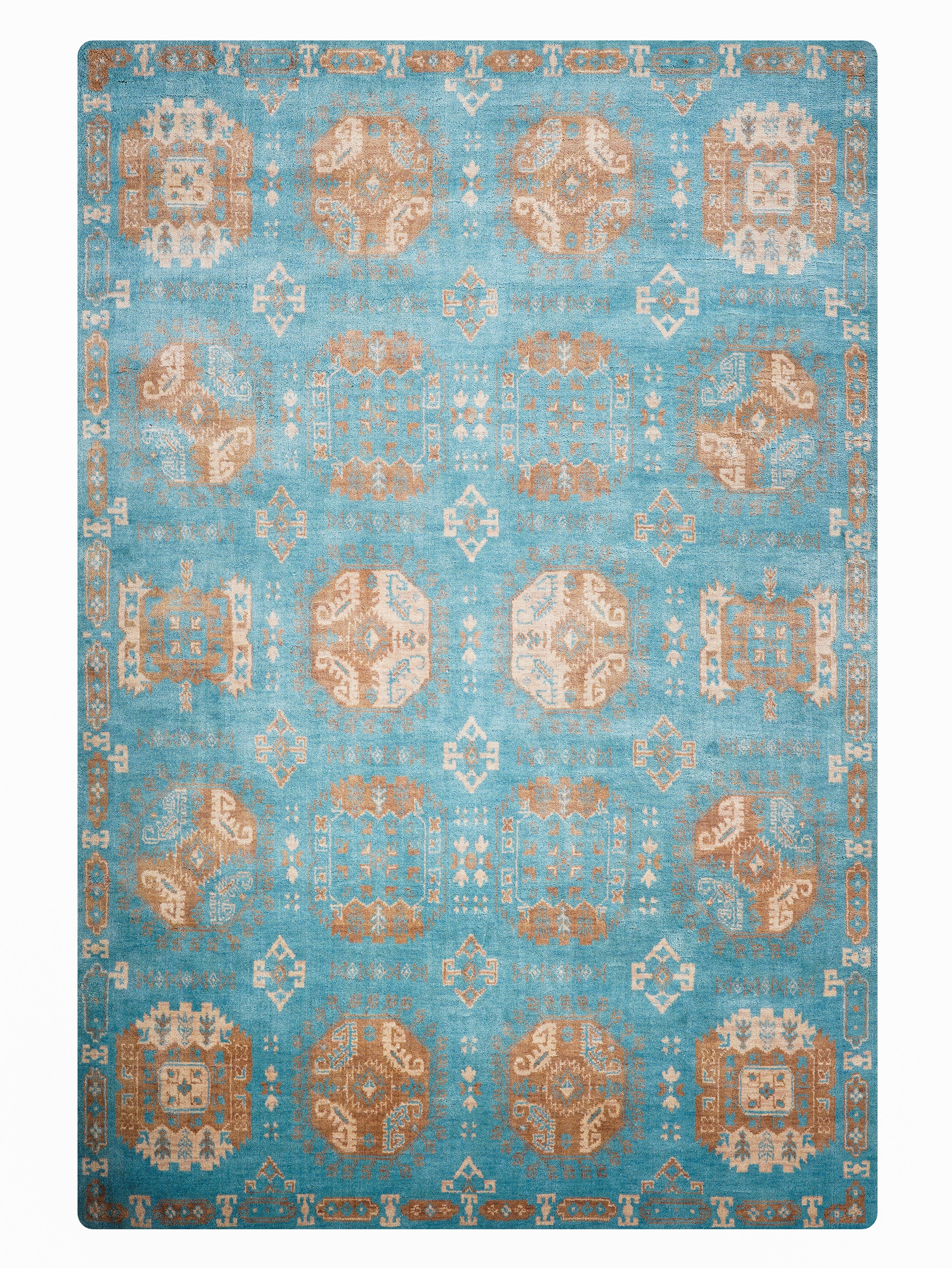 Blue area rug with geometric pattern