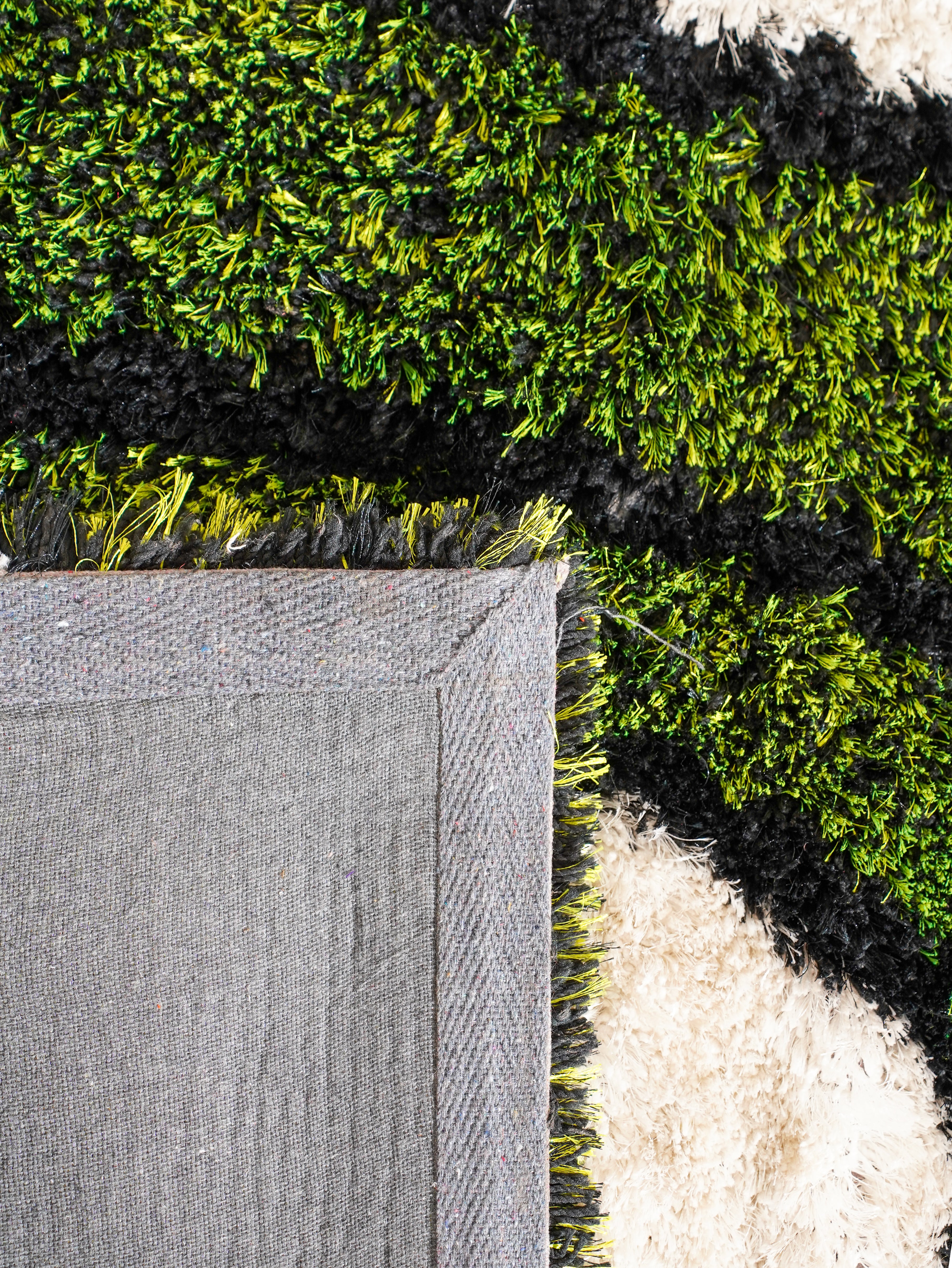 Qira Hand Tufted Shag Rug