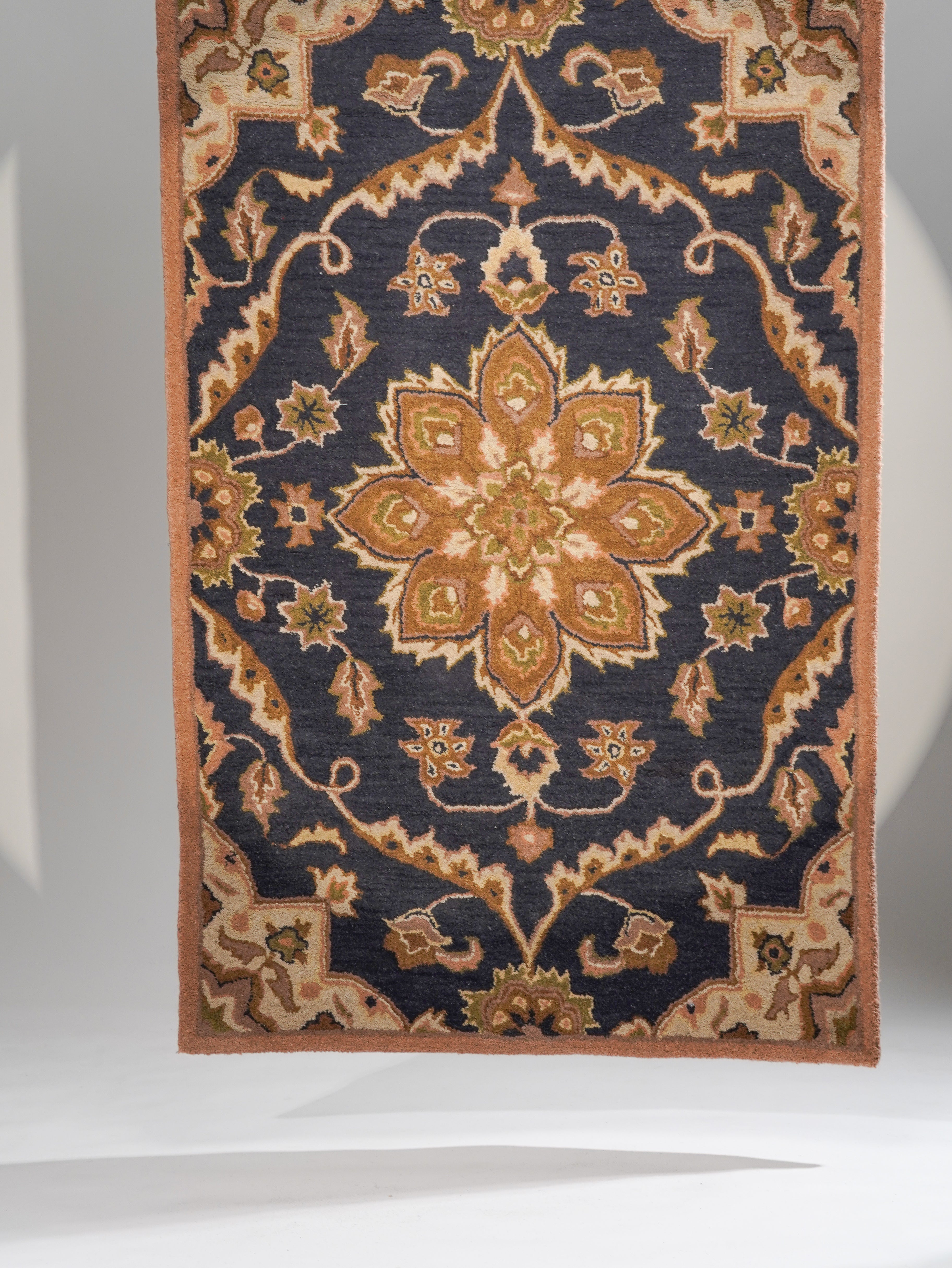 Aavira Hand Tufted Oriental Area Rug