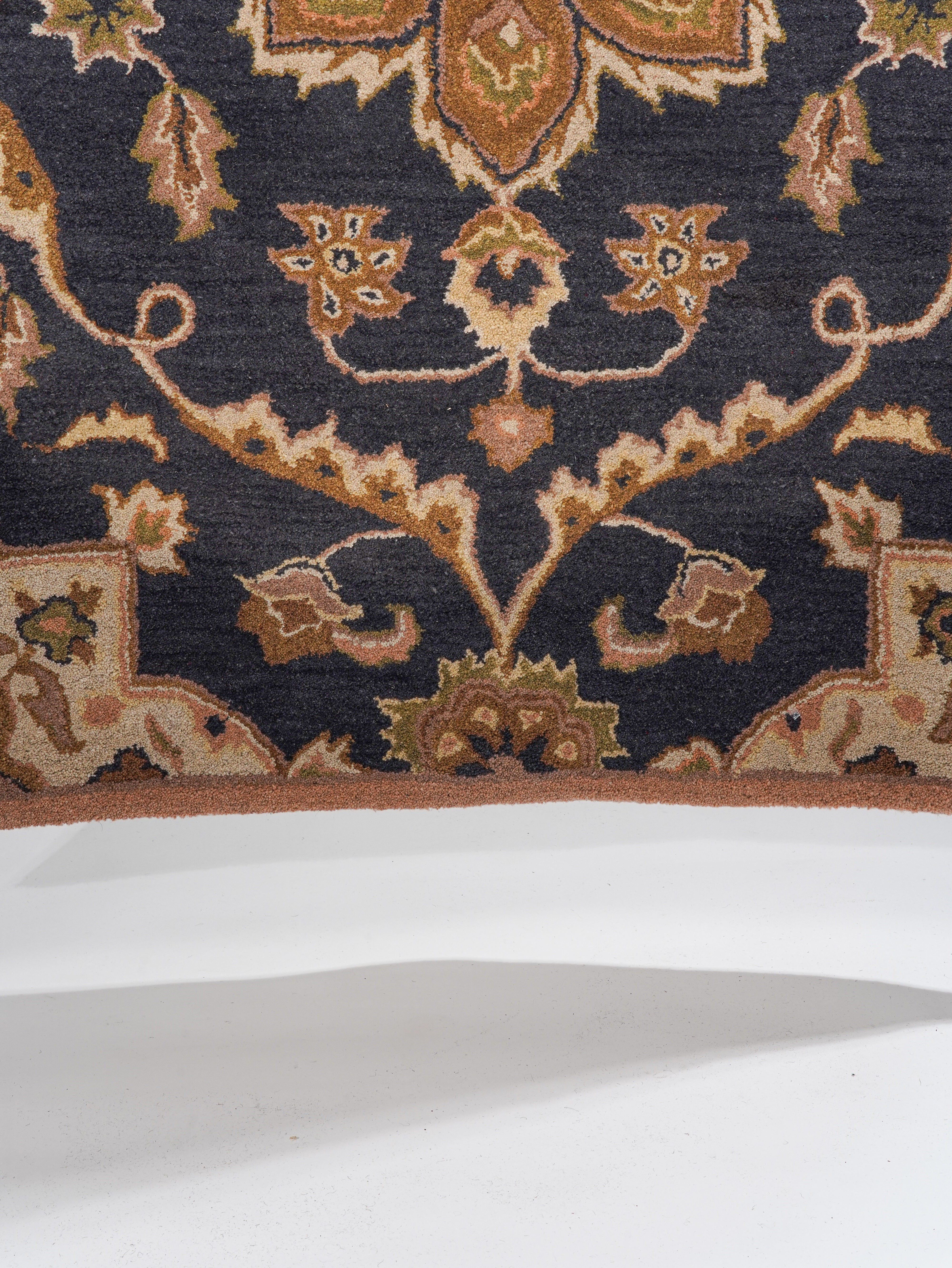 Aavira Hand Tufted Oriental Area Rug