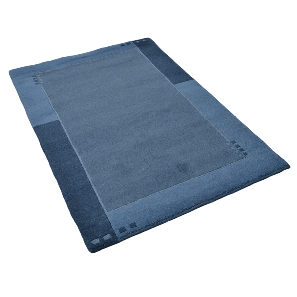 Leon Hand Knotted Tibbati Wool Area Rug