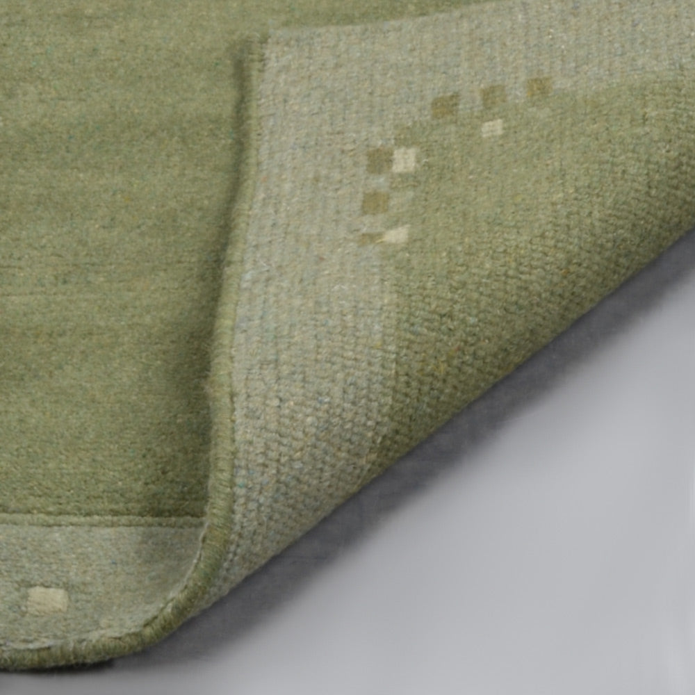 Leon Hand Knotted Tibbati Wool Area Rug