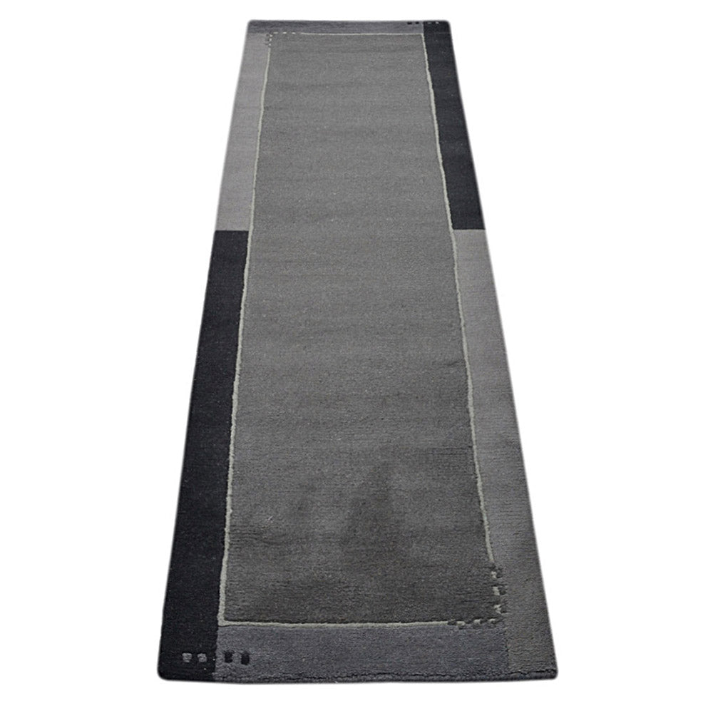 Leon Hand Knotted Tibbati Wool Area Rug
