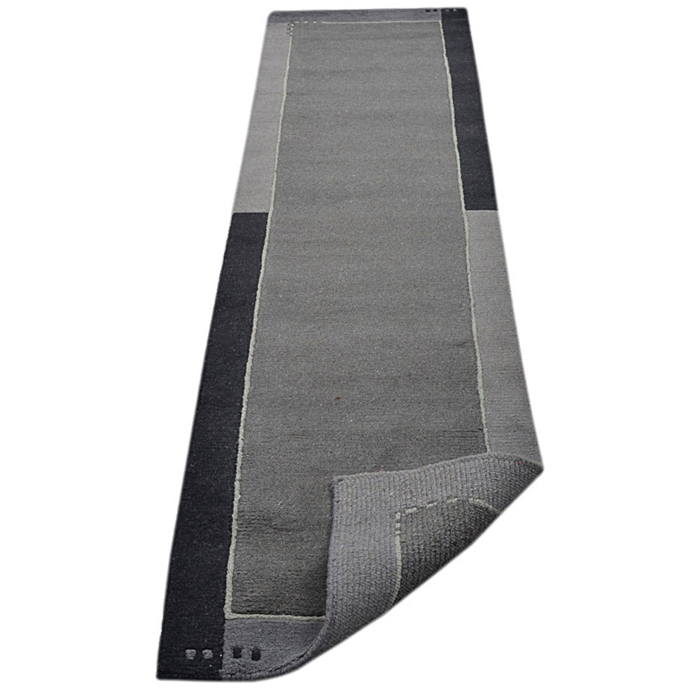 Leon Hand Knotted Tibbati Wool Area Rug
