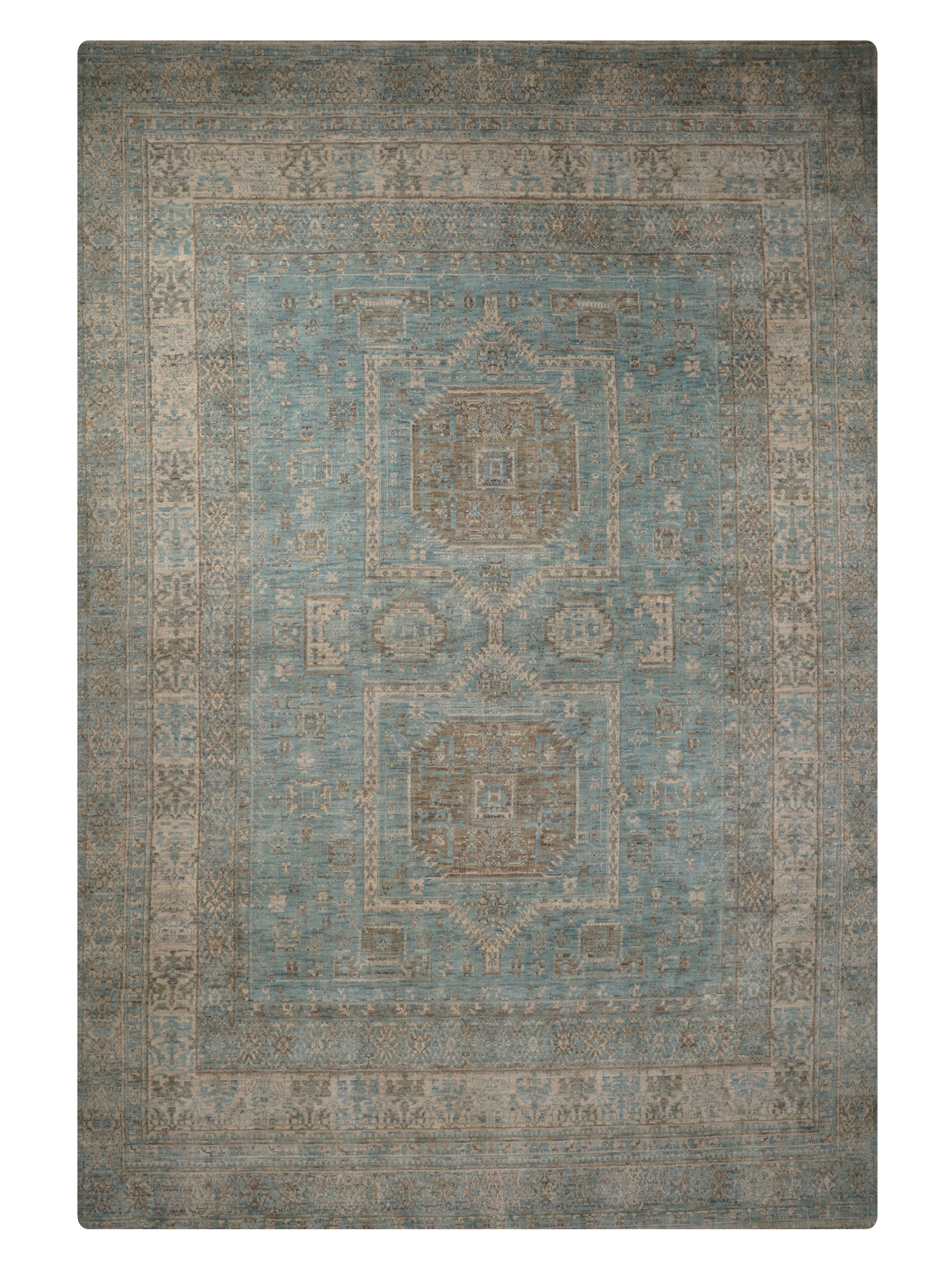 Decorative rug with geometric pattern on a plain background