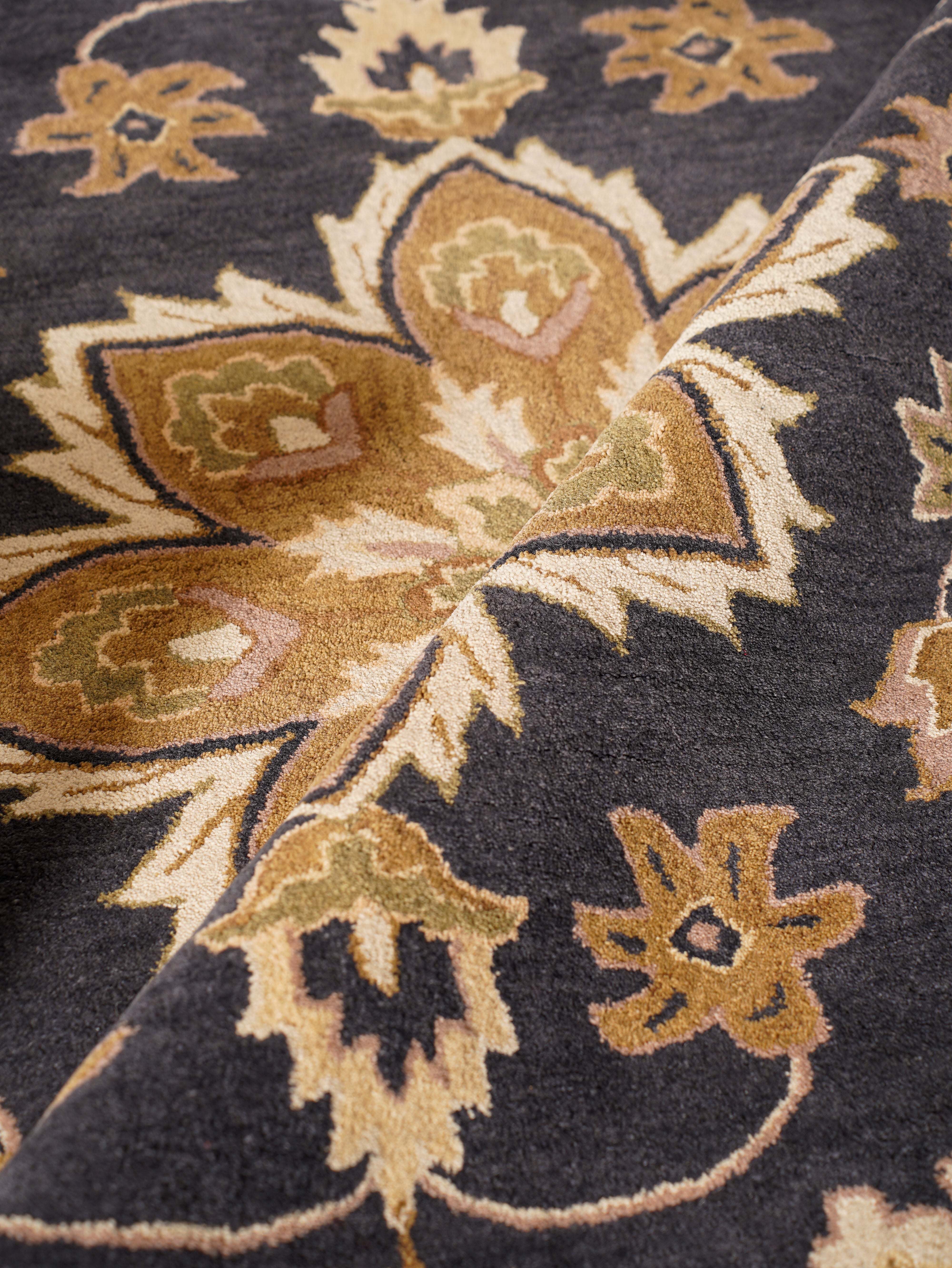 Aavira Hand Tufted Oriental Area Rug