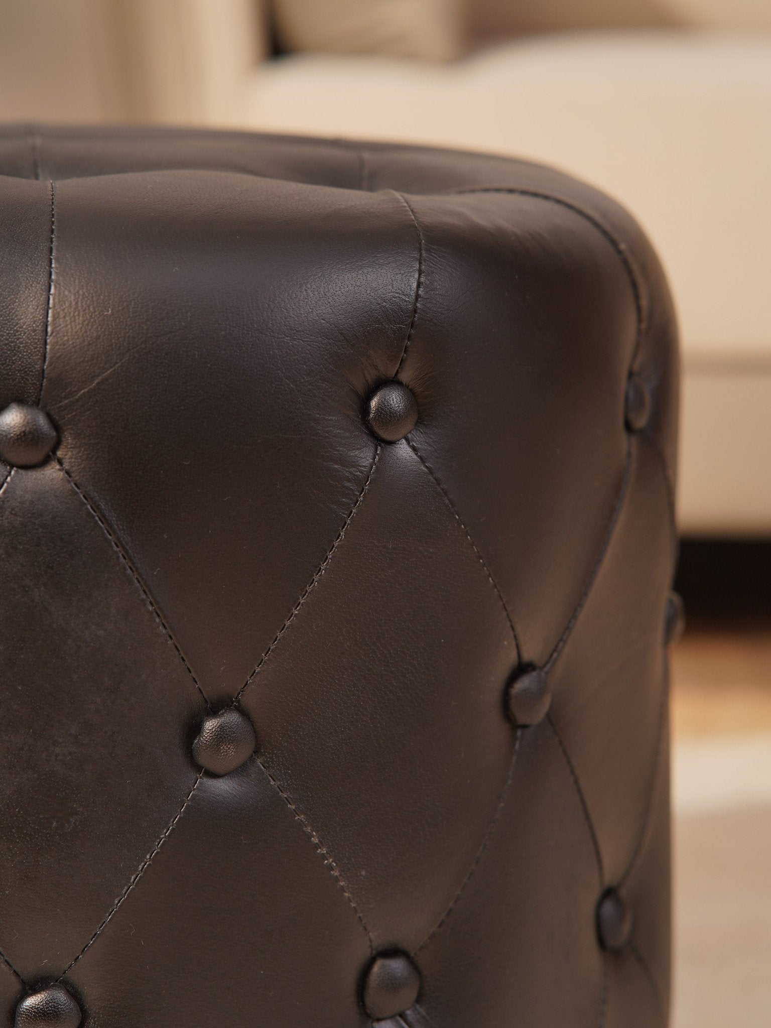 The Regal Repose – Round Tufted Leather Ottoman with Solid Wood Frame - BBH HOMES LLC