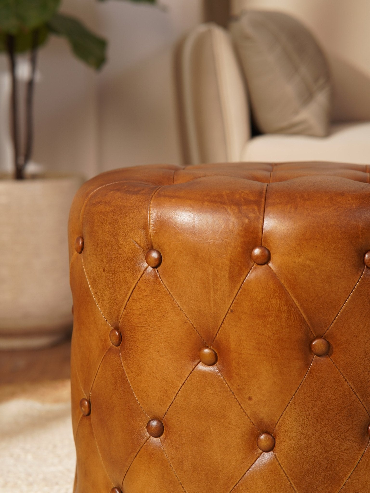 The Regal Repose – Round Tufted Leather Ottoman with Solid Wood Frame - BBH HOMES LLC