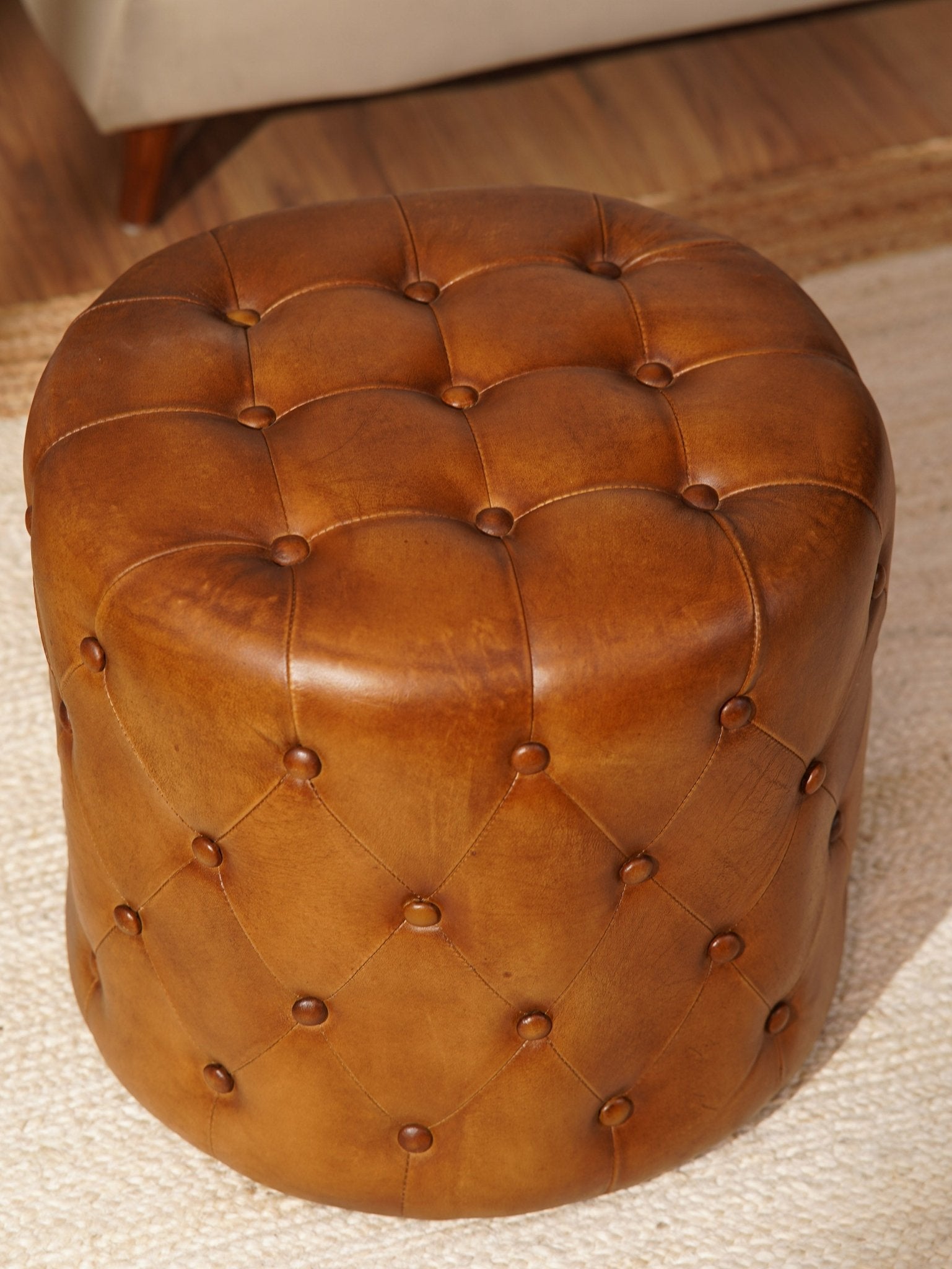 The Regal Repose – Round Tufted Leather Ottoman with Solid Wood Frame - BBH HOMES LLC