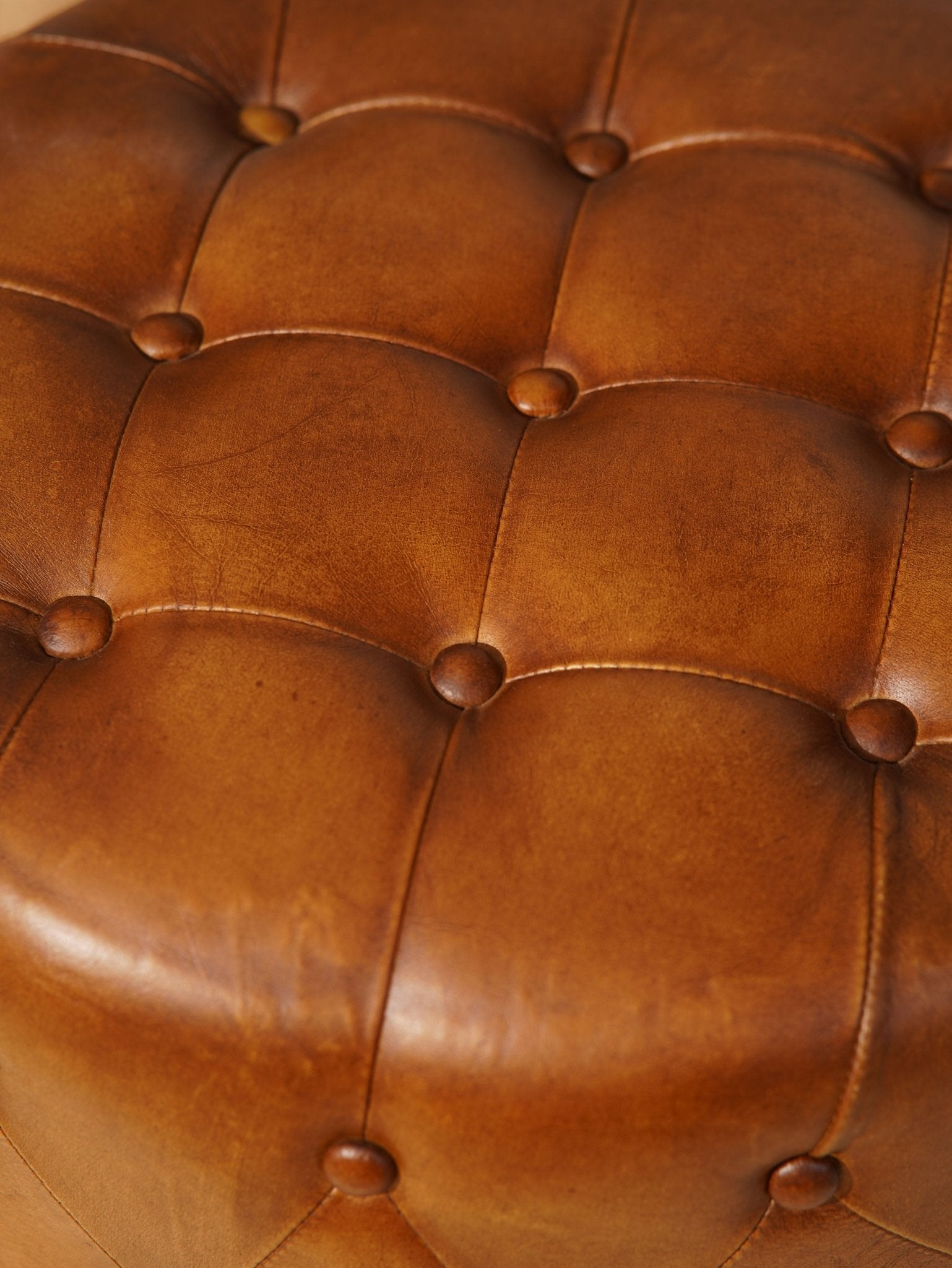 The Regal Repose – Round Tufted Leather Ottoman with Solid Wood Frame - BBH HOMES LLC