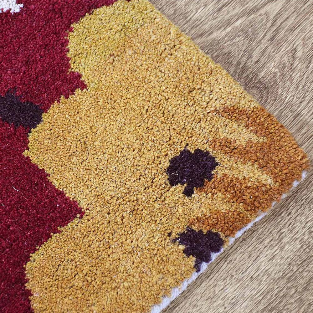 Rishit Hand Tufted Wool Area Rug