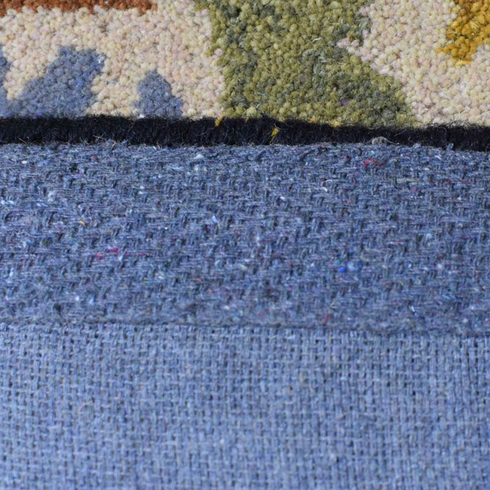Charvi Hand Tufted Wool Area Rug