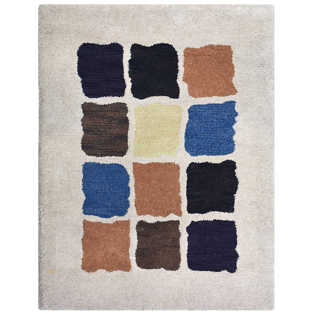 Ishanya Hand Tufted Wool Area Rug